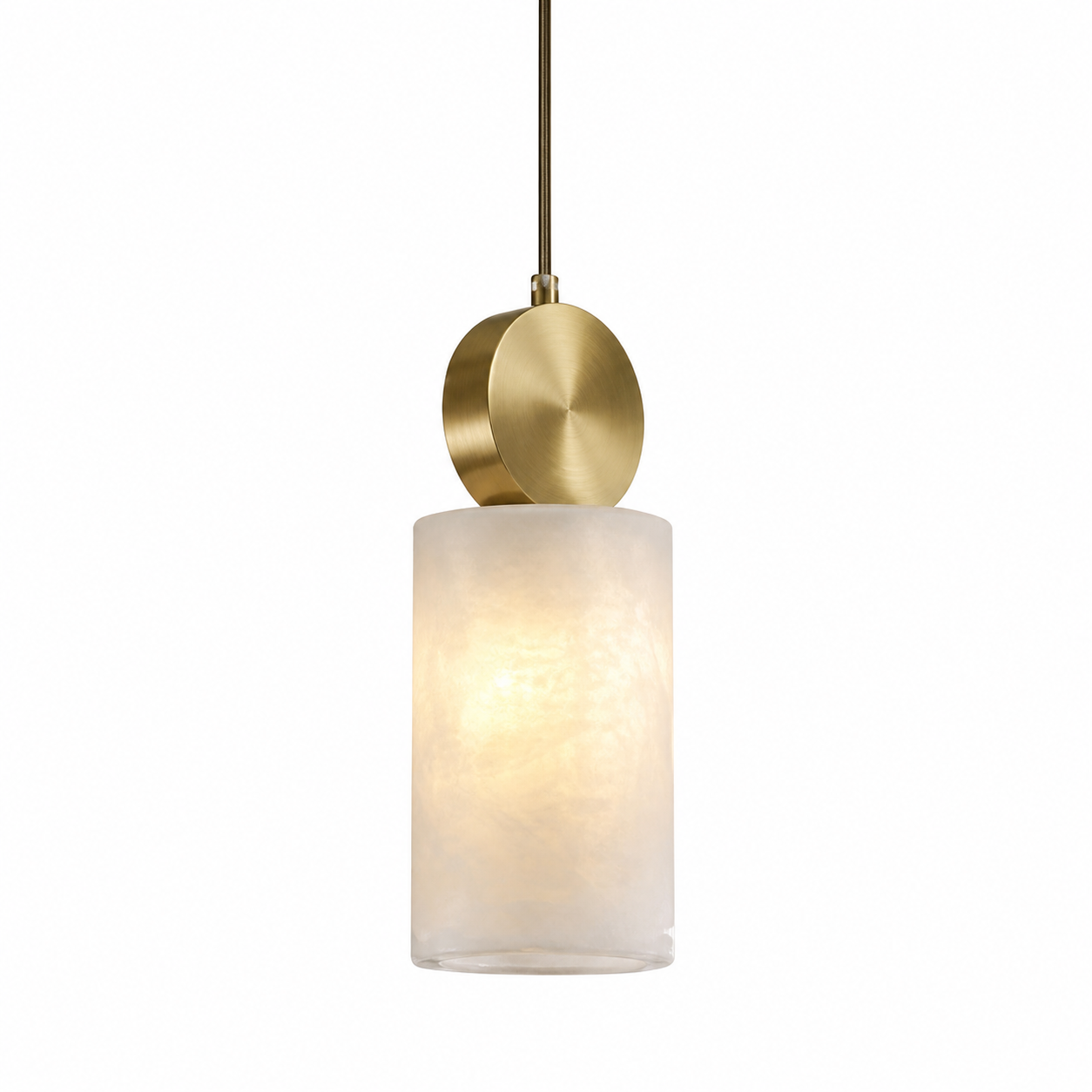 Elegant Hera marble pendant light casting a warm glow with minimalist golden trim detailing