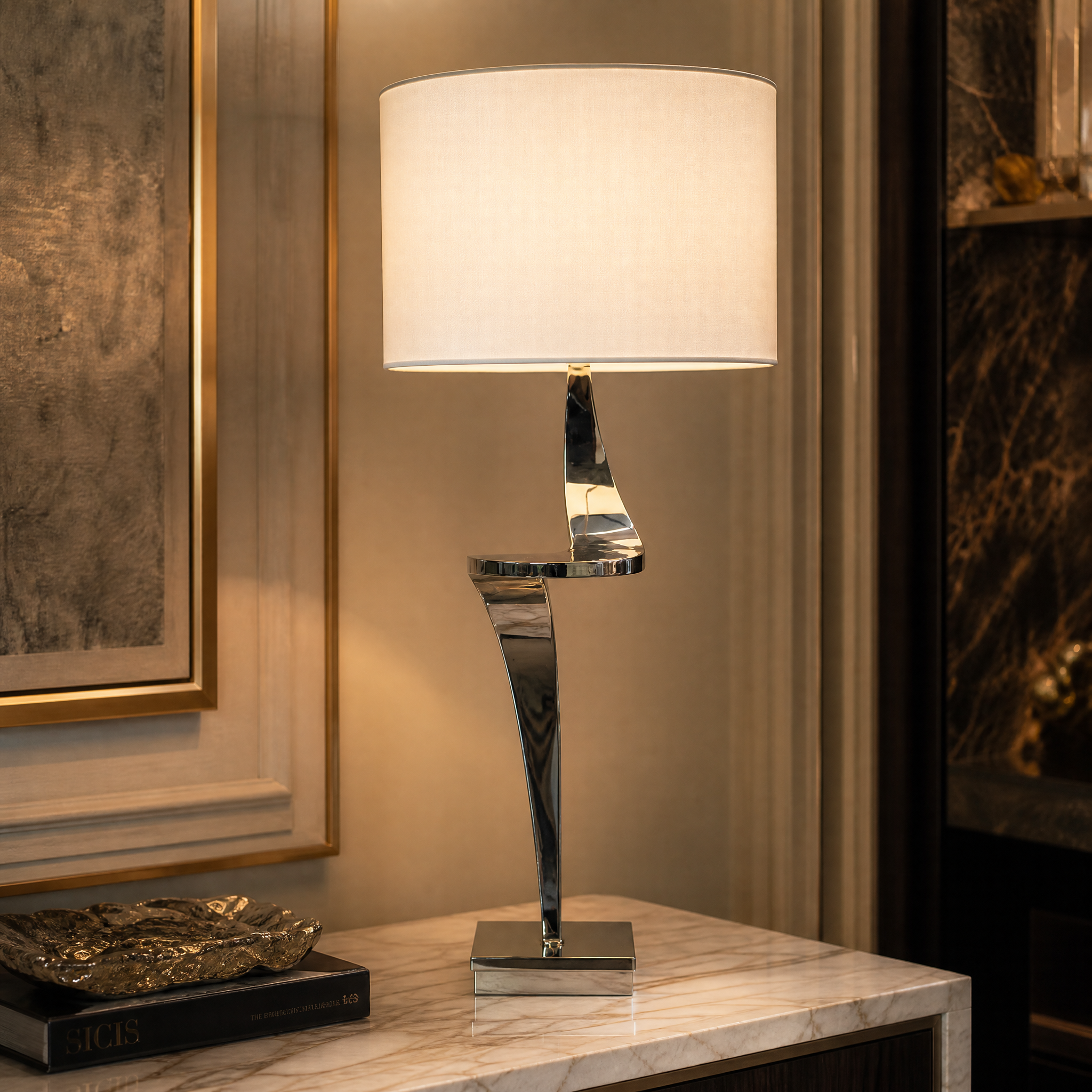 Close-up detail of the Elvoro table lamp showcasing its sculptural polished nickel twisted silhouette and soft fabric shade texture.