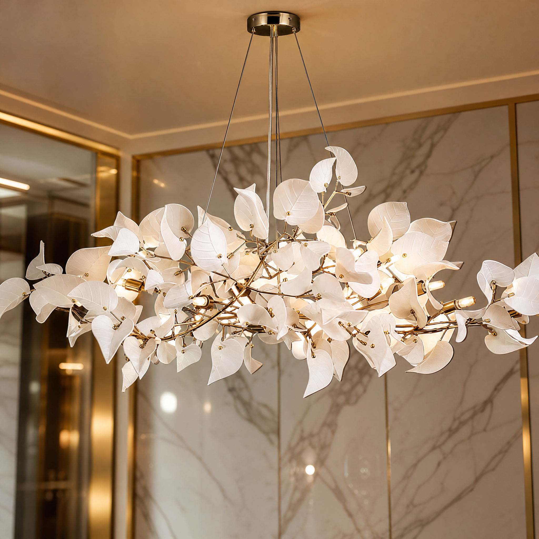 A detailed closeup of the Fiorella rectangular chandelier, highlighting the delicate, sculptural floral forms that create visual lightness and movement.
