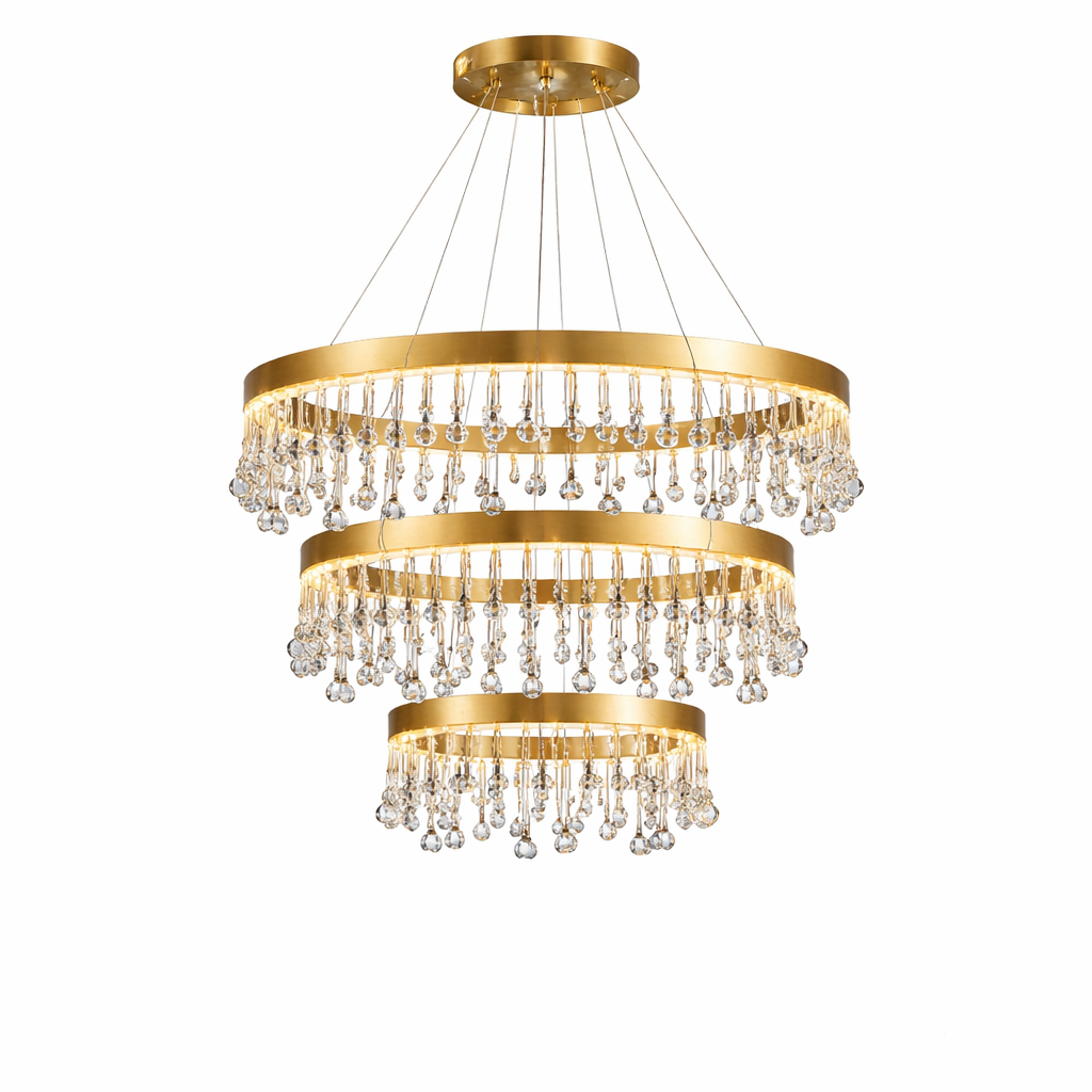 Glamorous ambient lighting reflecting off the layered crystal droplets of the VORELLI Mancini ring staircase chandelier.