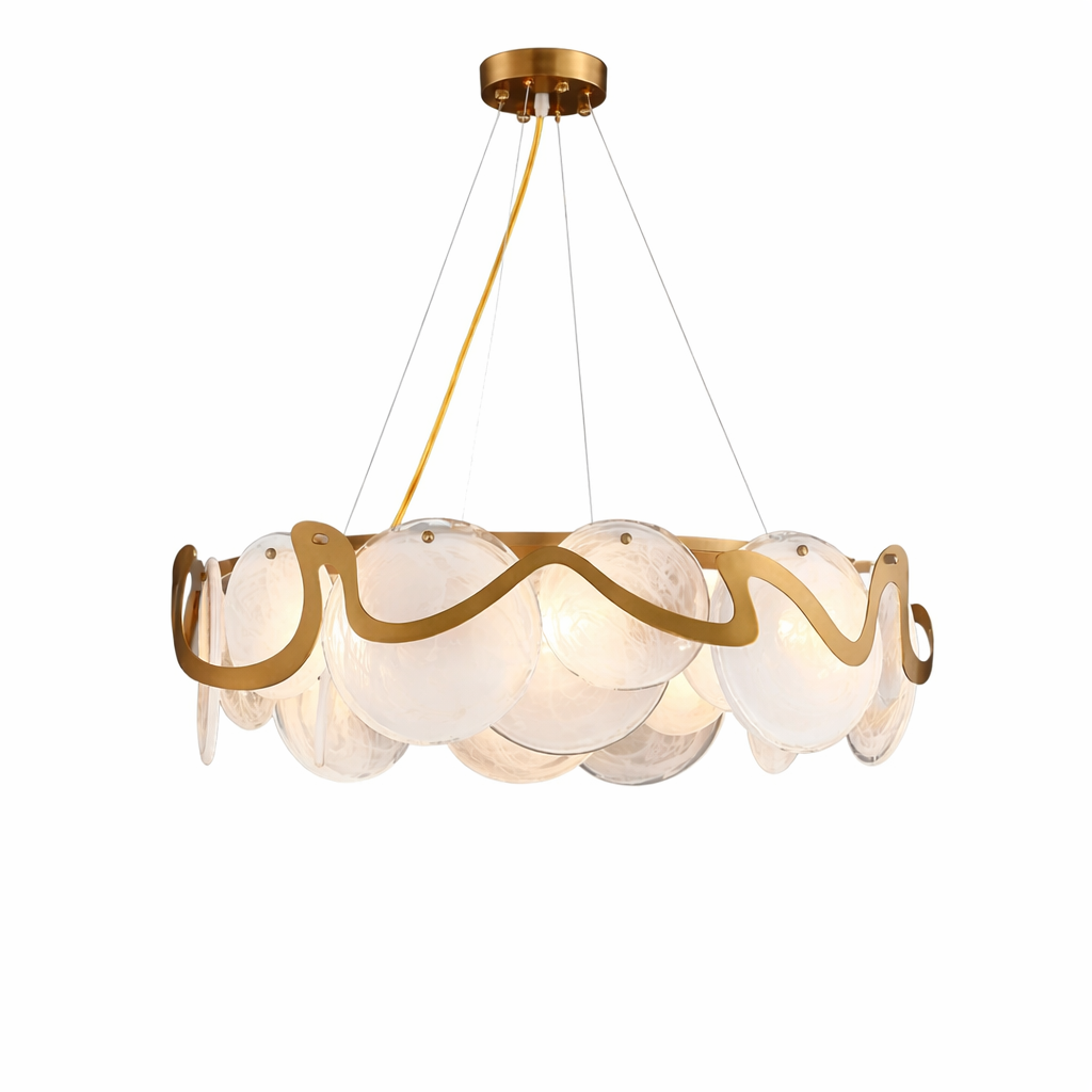 Glamour shot of the VORELLI Valparaíso Cristóbal circular chandelier, highlighting its waves of artisanal hand-blown glass and sophisticated mood.