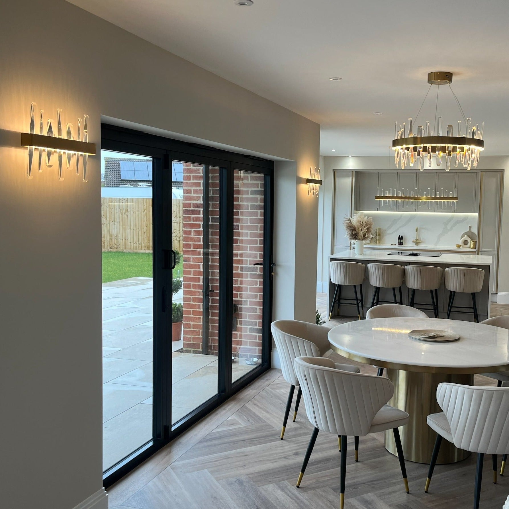 Grantchester Wall Light II adding refined ambient lighting to a luxury dining space