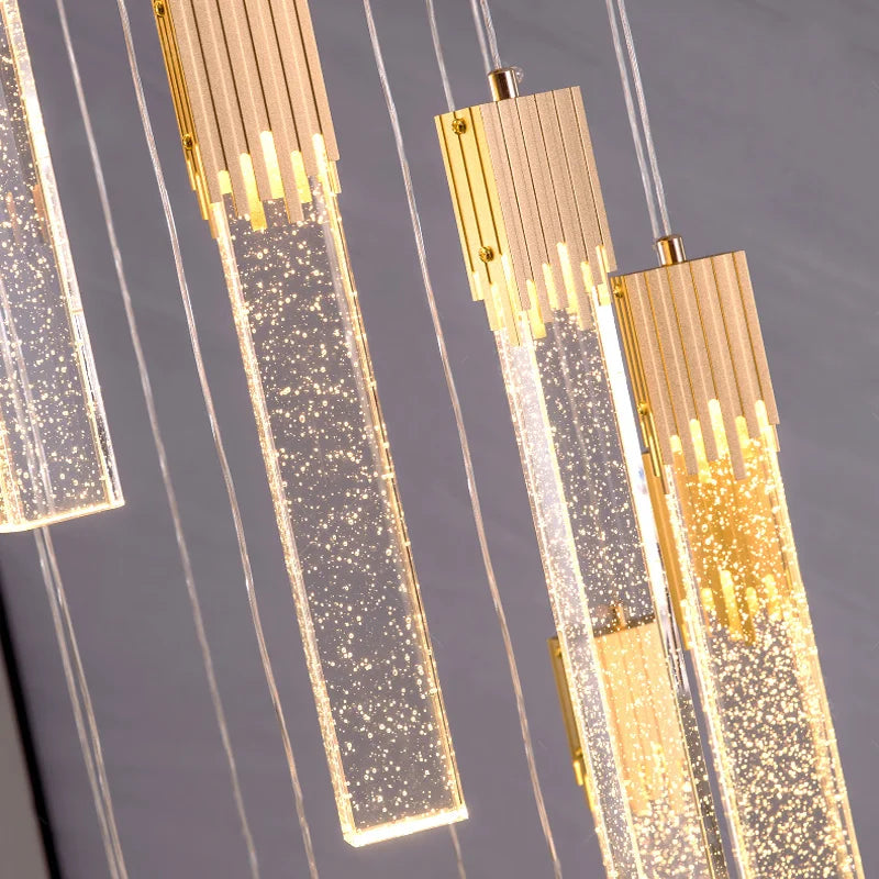 Close-up of illuminated bubble crystal bars on the Halstead Pendant Staircase Chandelier