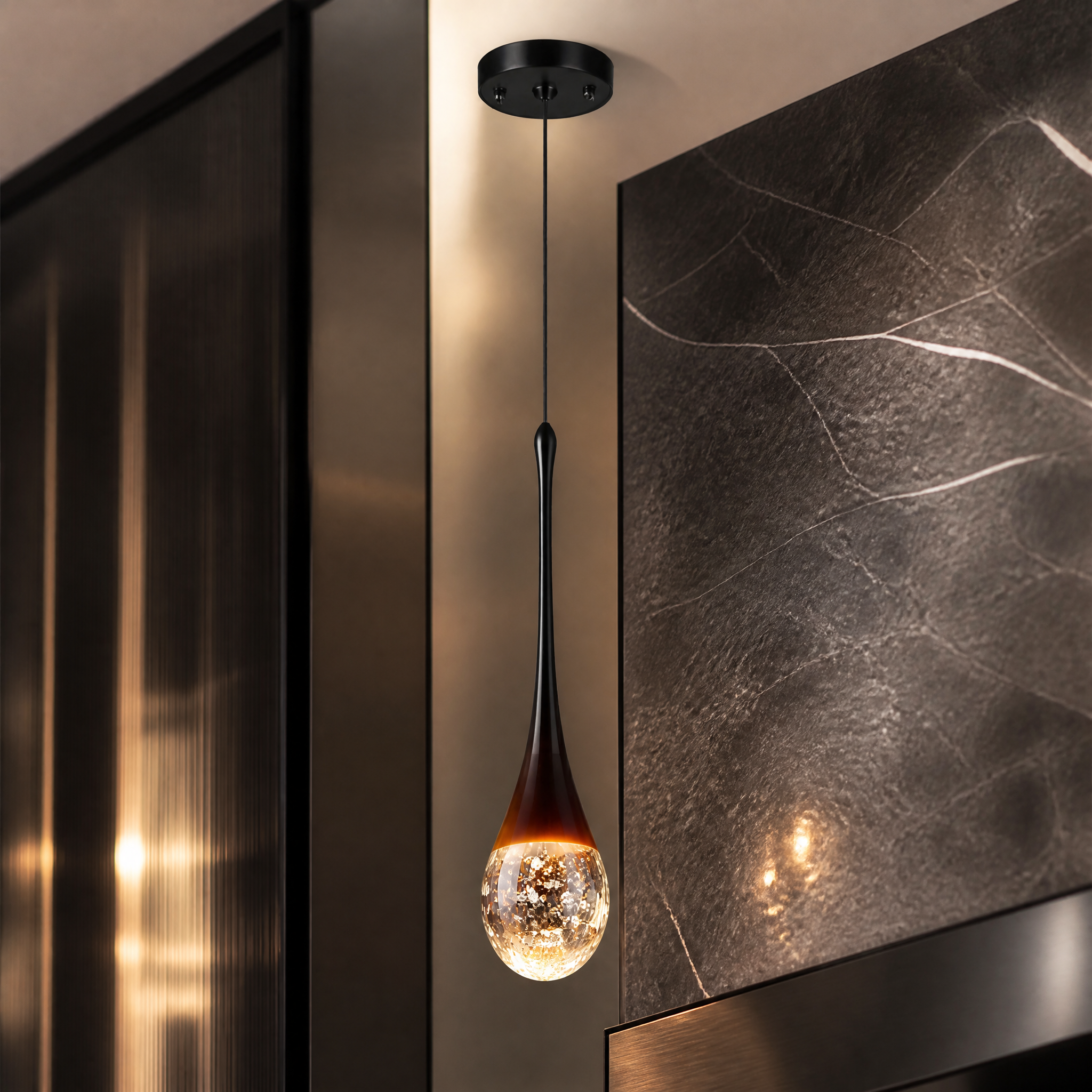 A detailed closeup of the VORELLI Henley pendant light, showcasing the texture of the intricate bubble glass and the sleek form.