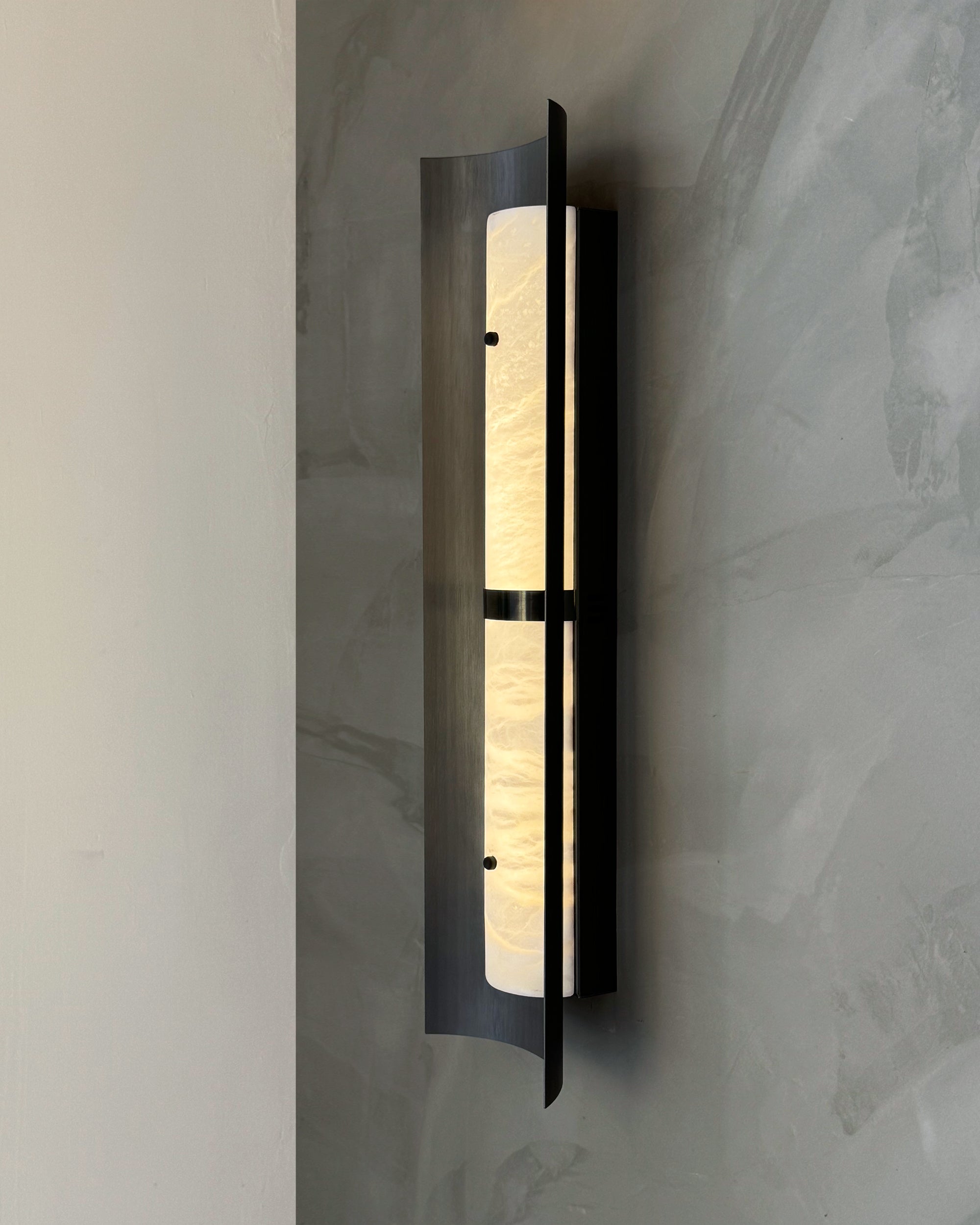 Hercules Marble Wall Light highlighting sleek modern structure and natural marble illumination