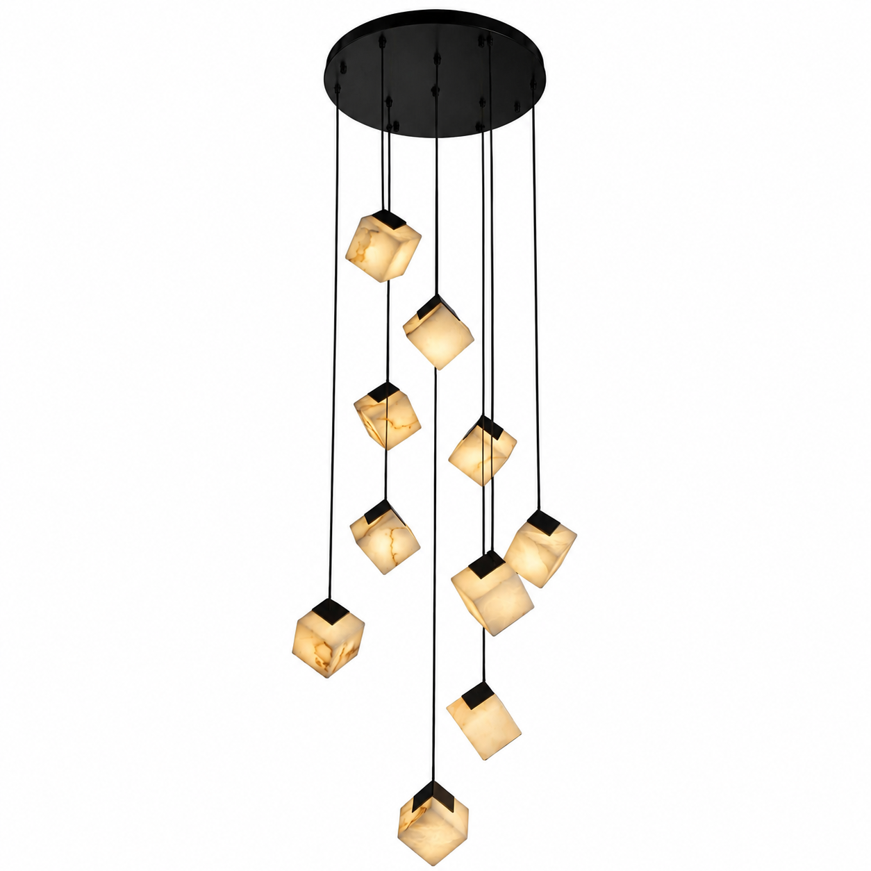 Intimate atmospheric shot capturing the rich veining and soft golden diffusion of the luxury marble cube pendants.