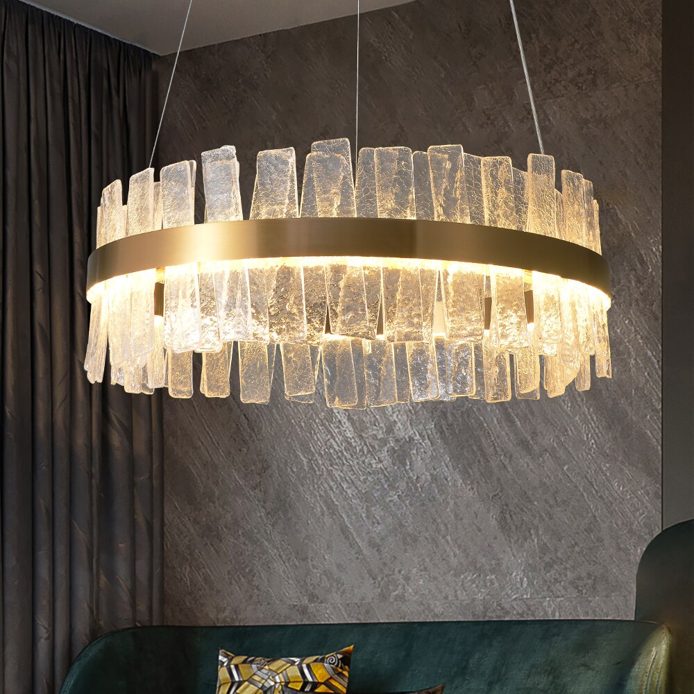Kensington circular chandelier with cracked crystal ring creating warm luxury ambient lighting
