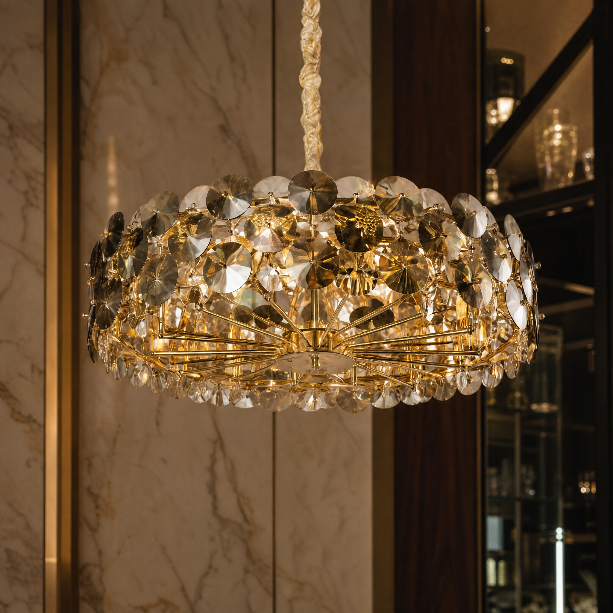 Macro closeup shot highlighting the exquisite diamond-cut clear and smoky grey crystal discs of the VORELLI Lorenzo luxury chandelier.
