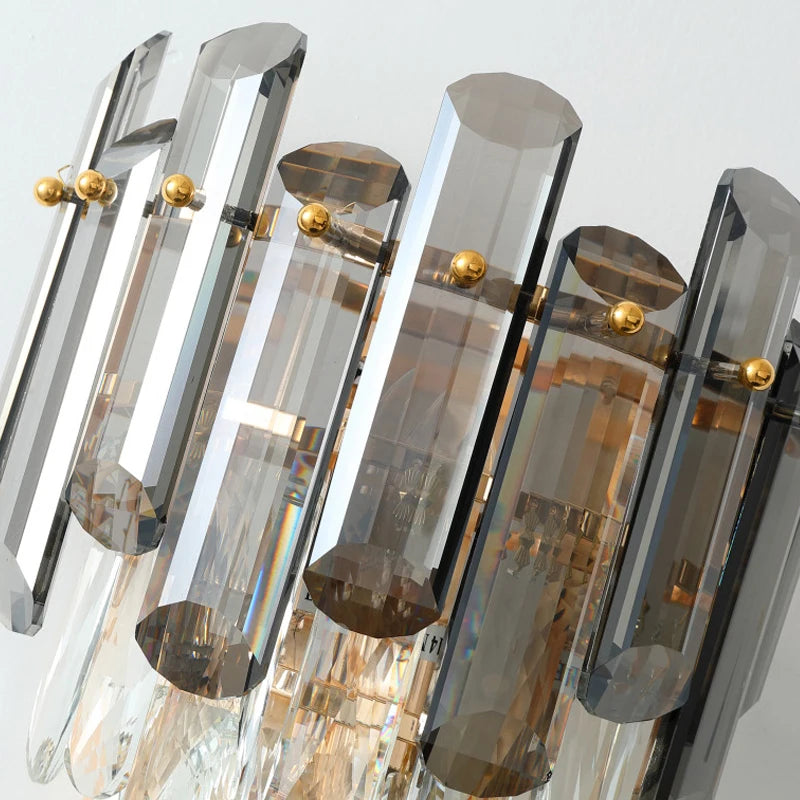 Detailed view of Lugano Wall Light smoky grey oblong crystal arrangement