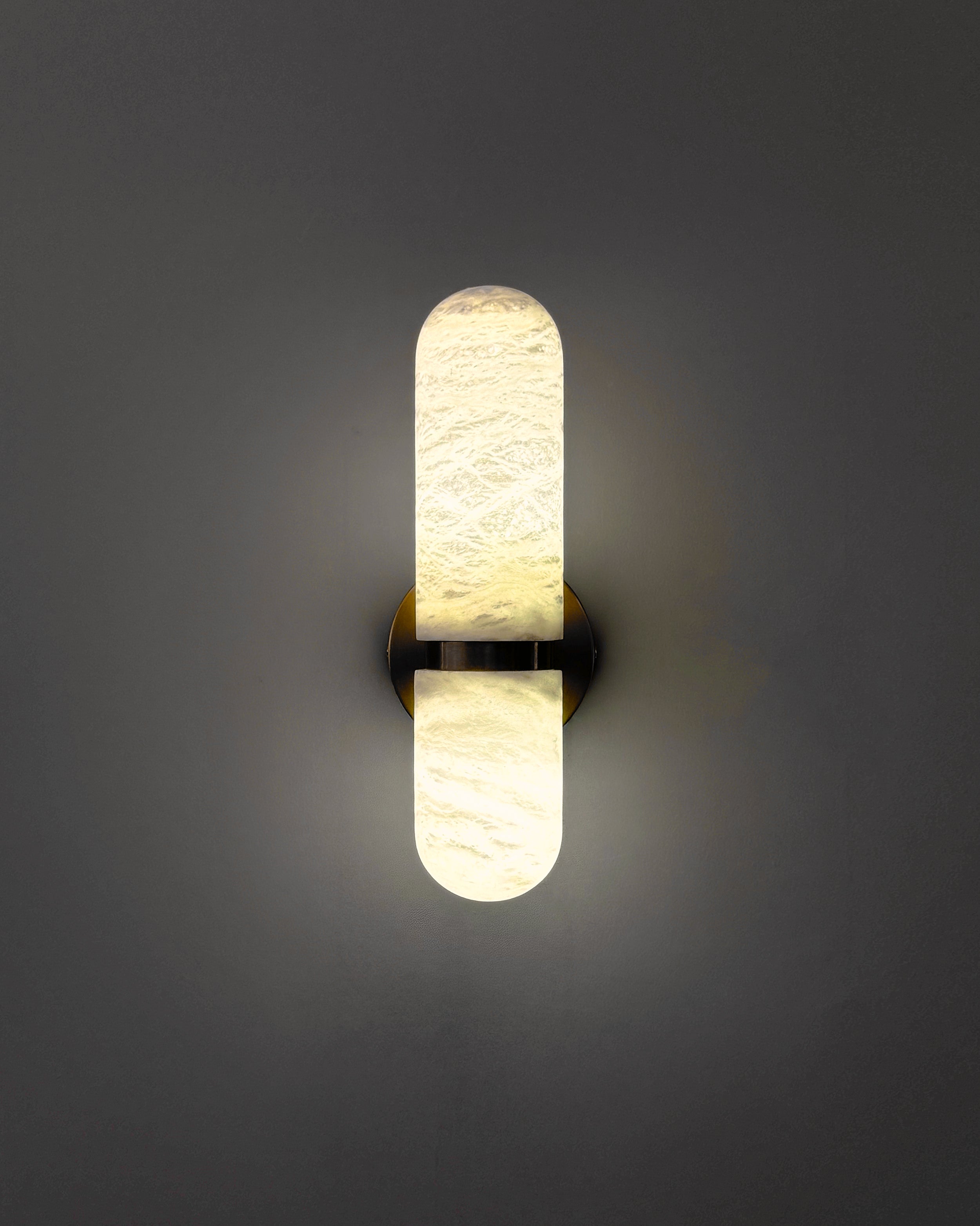 Close up of natural marble veining on the Luma wall light shade