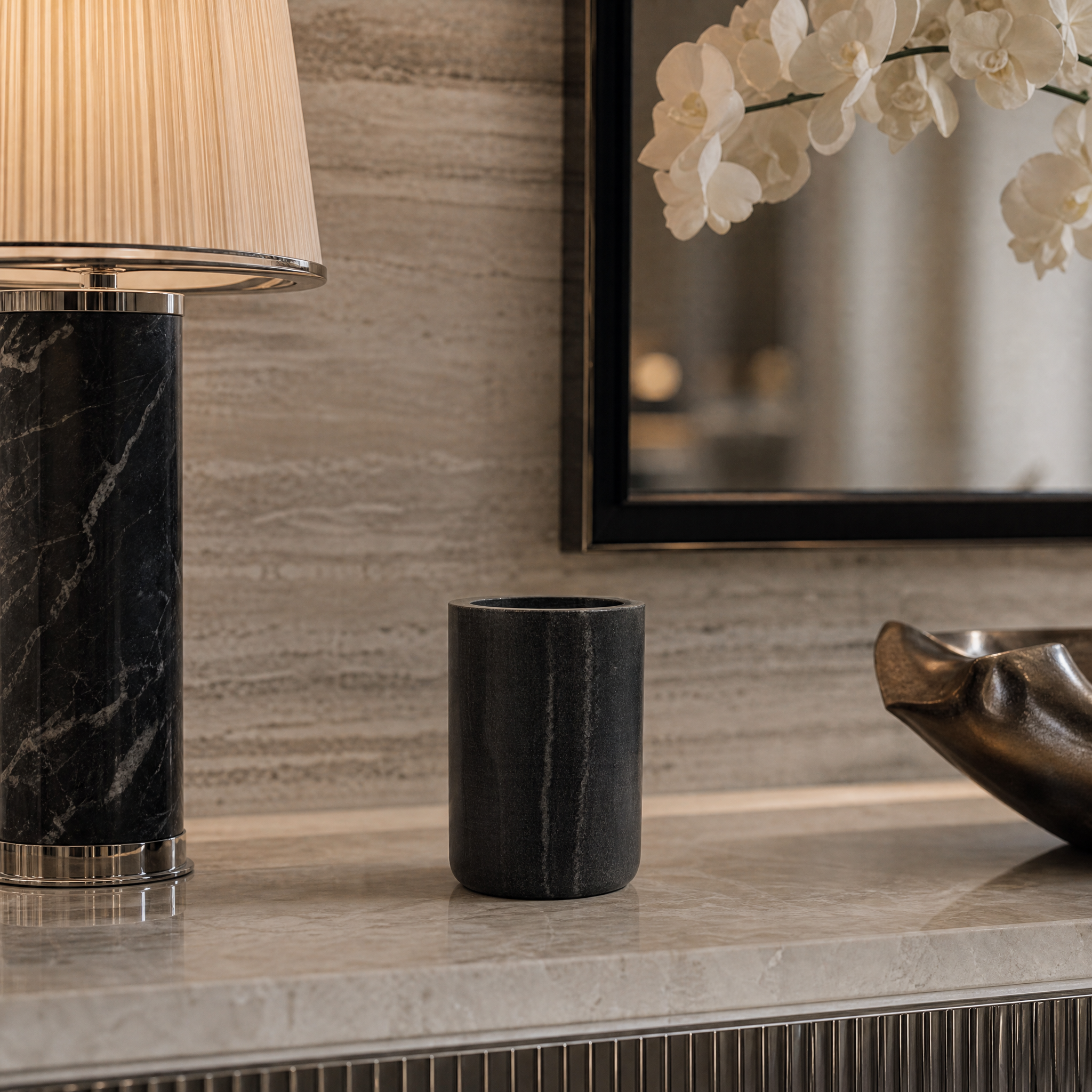 The minimalist Lunetta H15CM marble vase enhancing the sophisticated ambiance of a boutique hotel lobby reception.