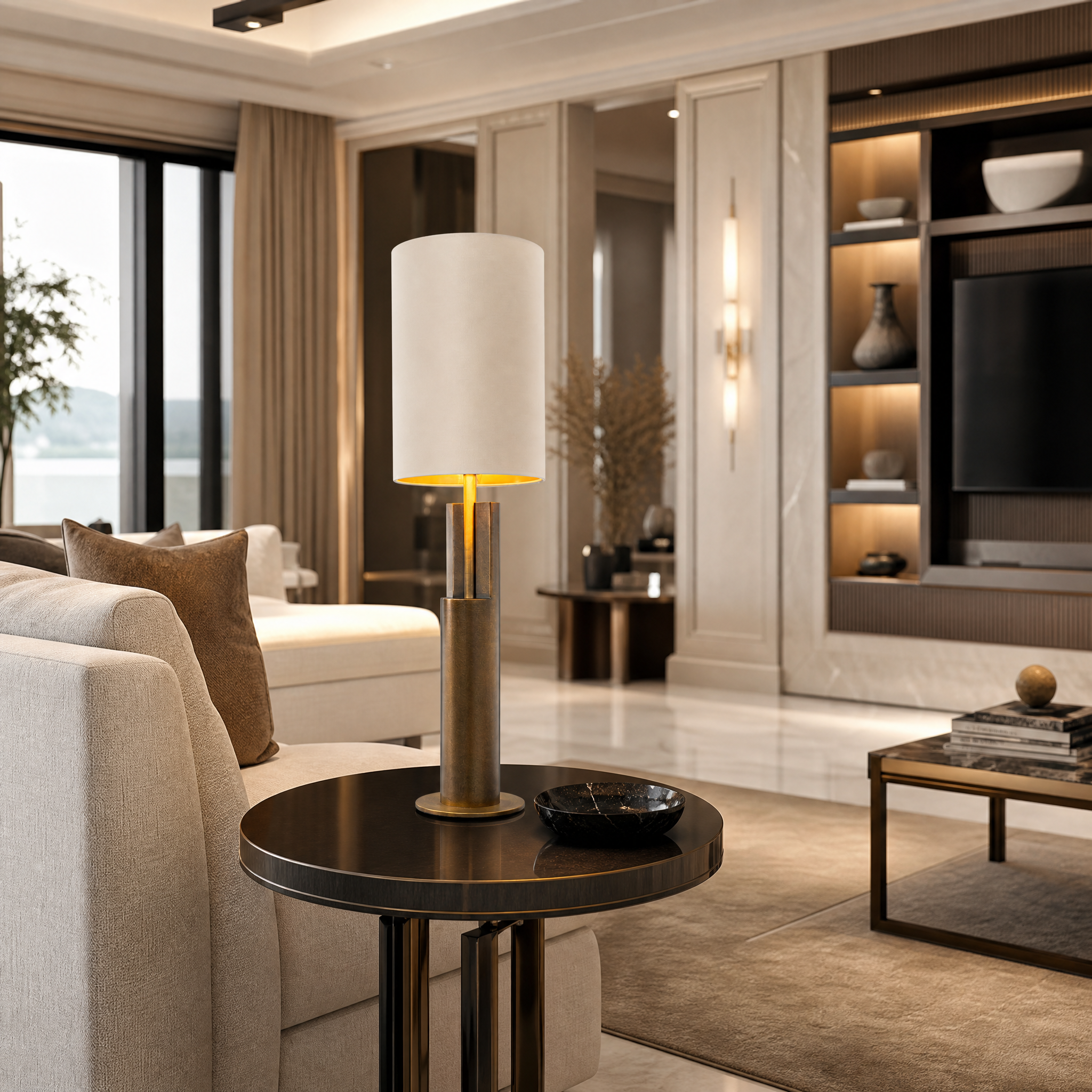 The Marvello brass table lamp by Vorelli illuminates a sophisticated living room console table with a warm ambient glow.