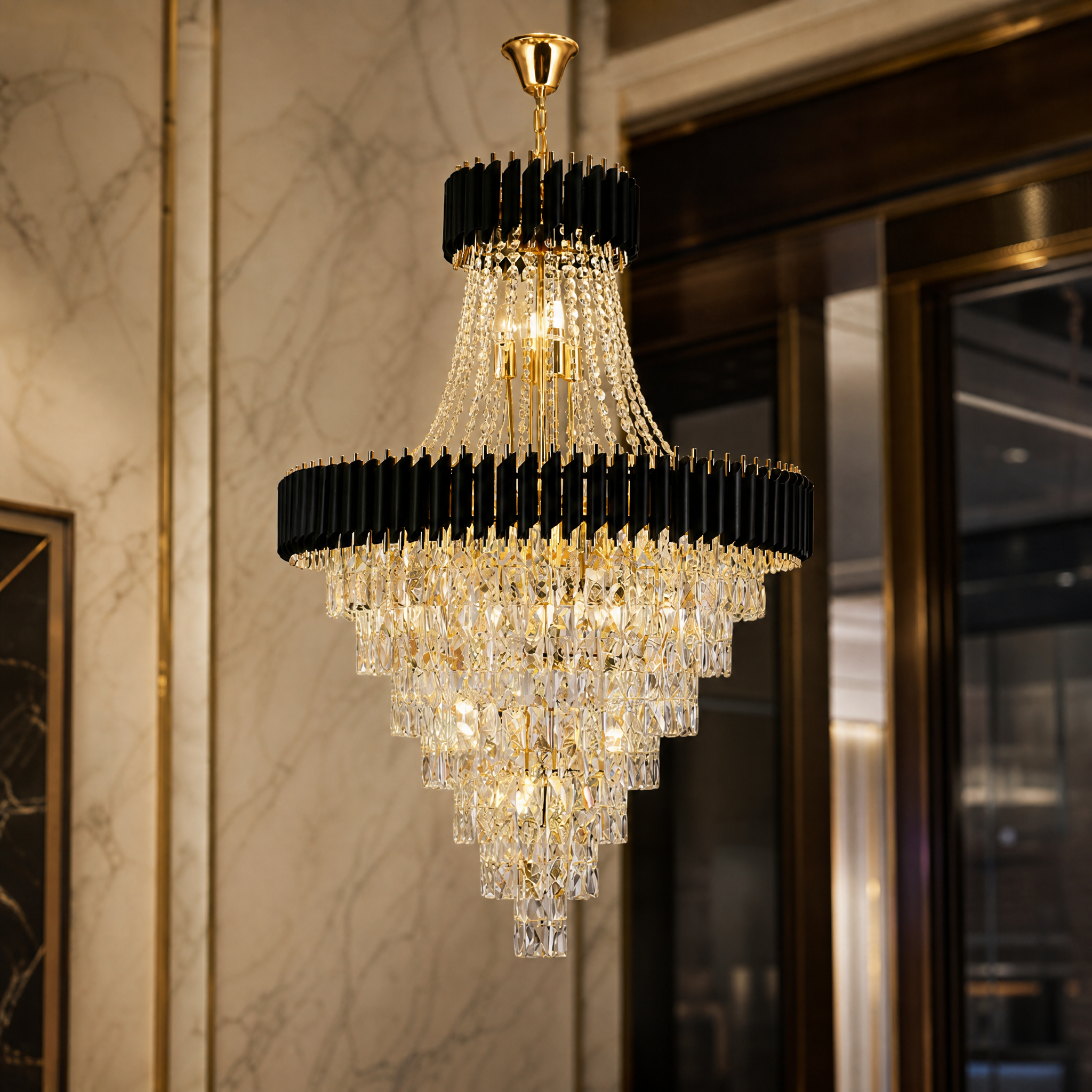 Macro close-up of the VORELLI Milltimber Grandeur chandelier showing the intricate layered diamond-cut crystal drops encased in premium matte gold architectural fins.