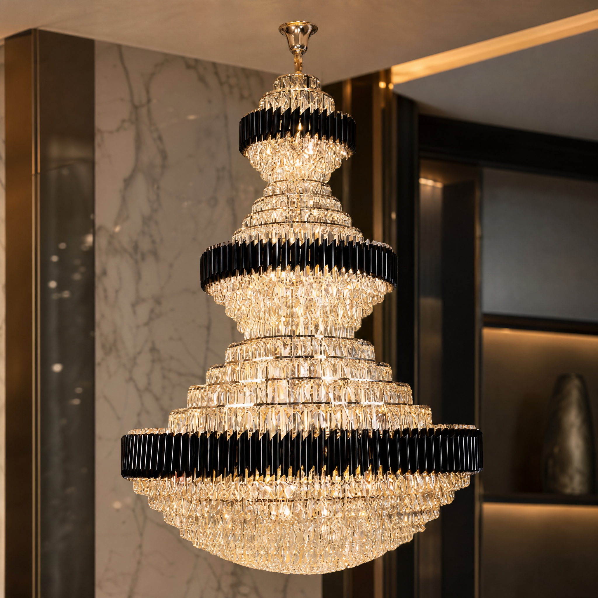Macro closeup of the VORELLI Milltimber Grandeur Staircase Chandelier II showing the premium combination of sleek cylinder tubing and dazzling rectangular crystals.