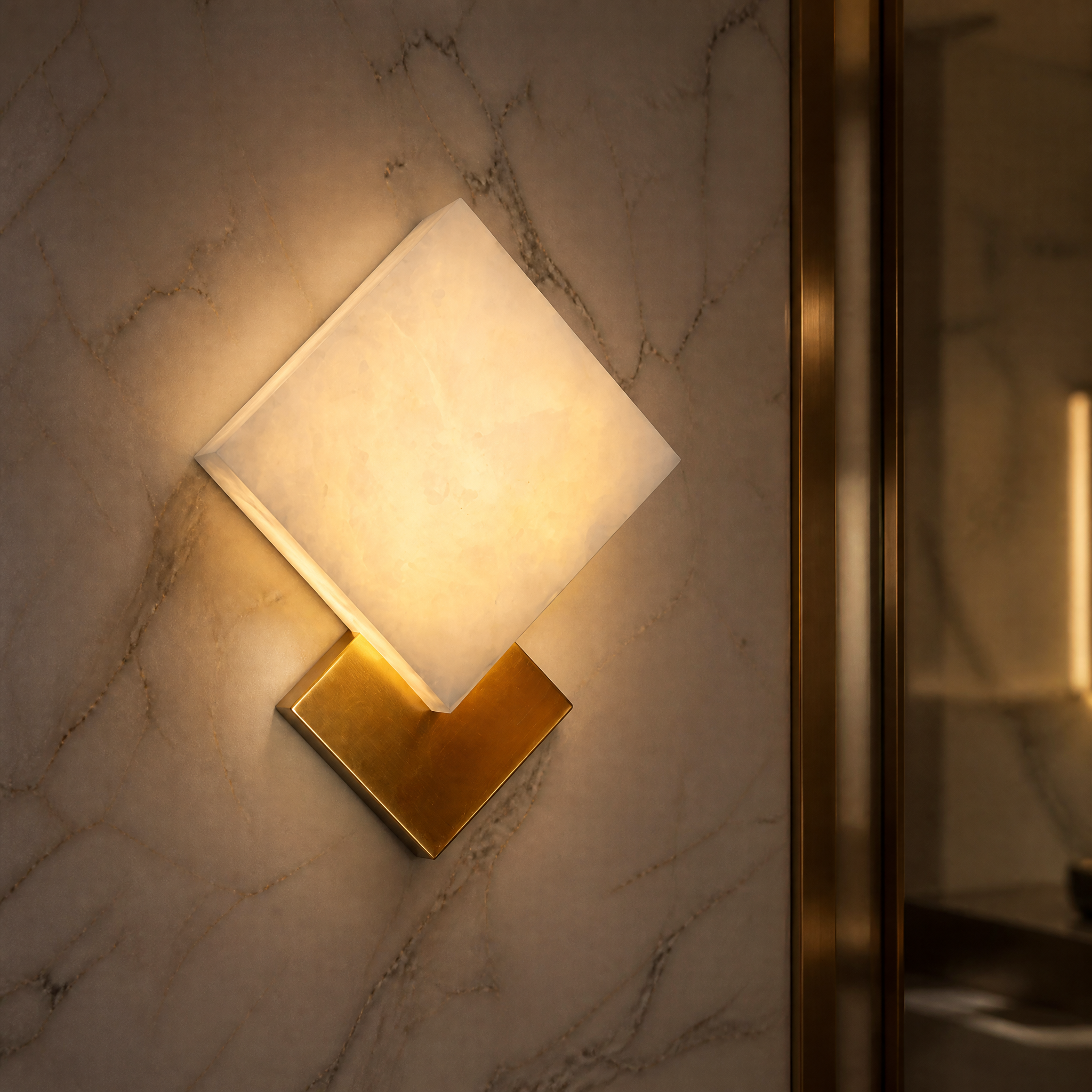 Macro view of the Modena wall light showing the striking contrast and fine texture of the sculpted classic marble material.