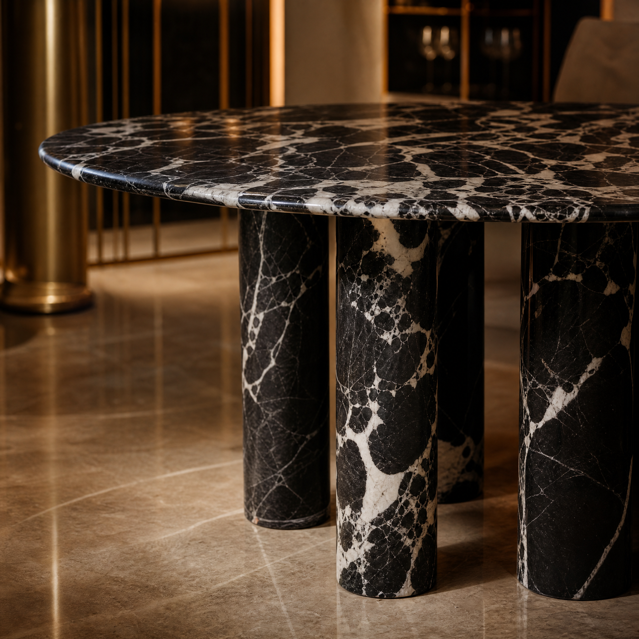 A detailed close-up shot of the Olivaro dining table, showcasing the intricate, eye-catching patterns and deep texture of the premium French Napoleon Black marble.