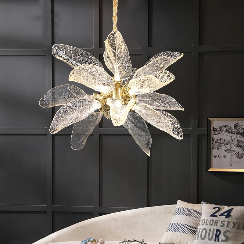 Close-up of Ottobre pendant light showing sculpted glass leaf ceiling detail