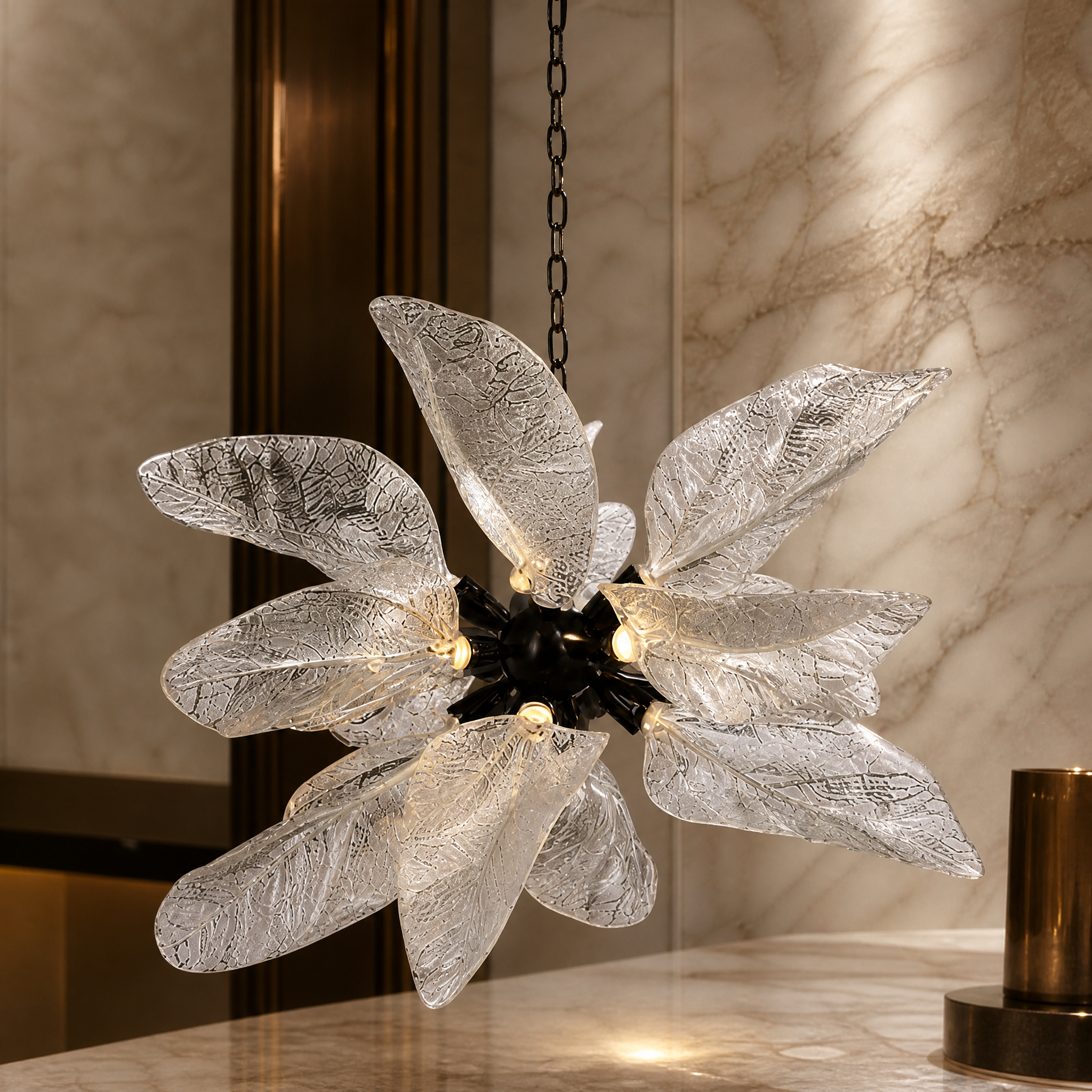 Close-up of the delicate, handcrafted glass leaf texture of the Ottobre Pendant Light, showcasing light diffusion and craftsmanship.