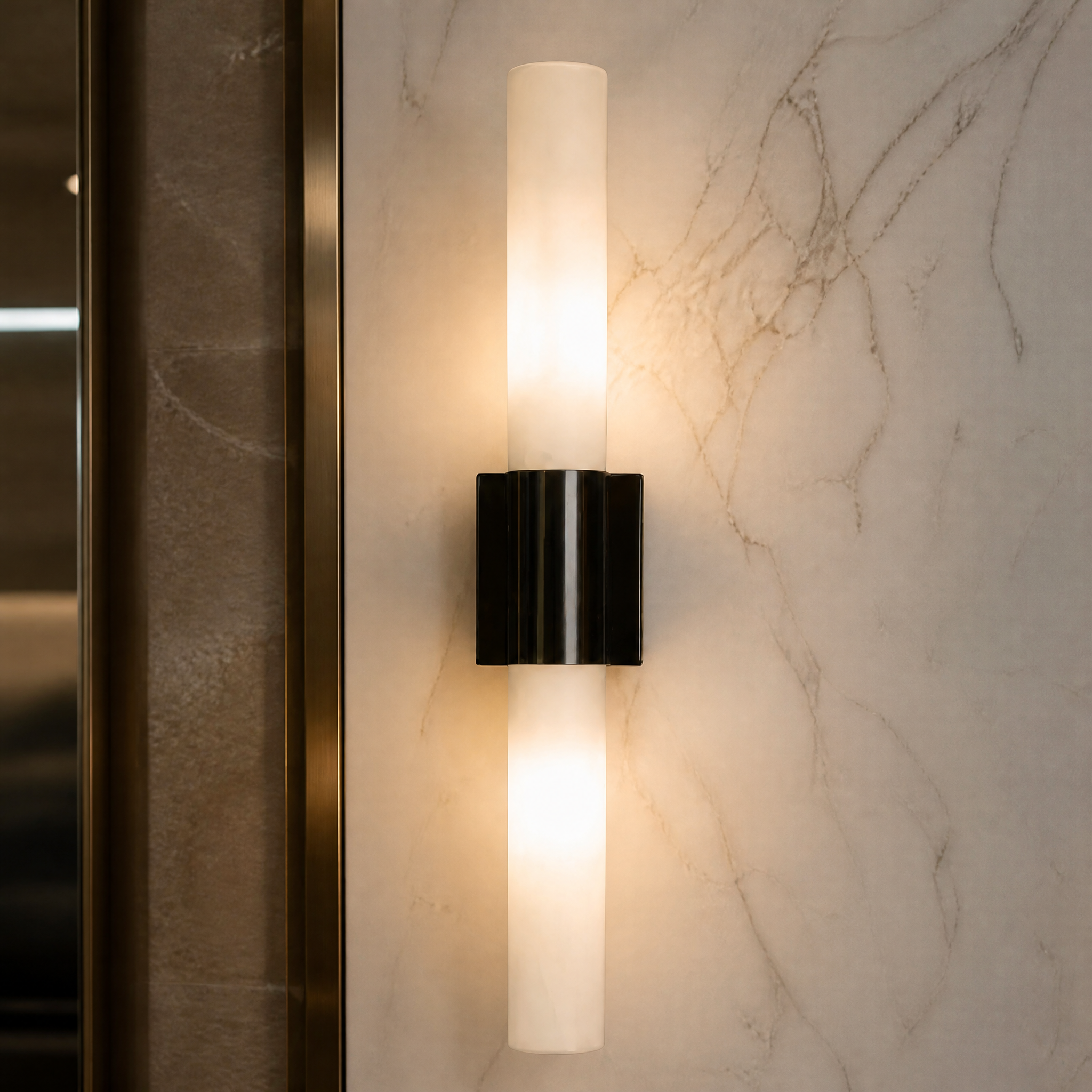 Macro close-up of the VORELLI Palermo wall light, highlighting the smooth texture of the marble diffusers and the bold central black detail.