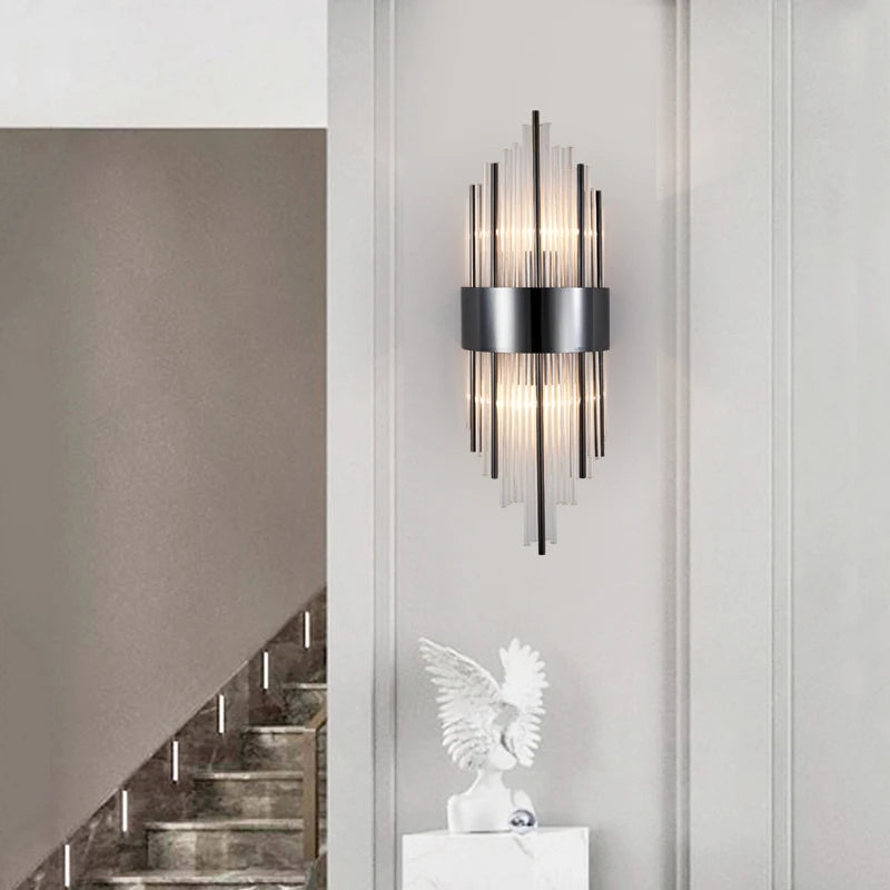Close up of vertical cylindrical tubing and structured frame on Piper Point wall light