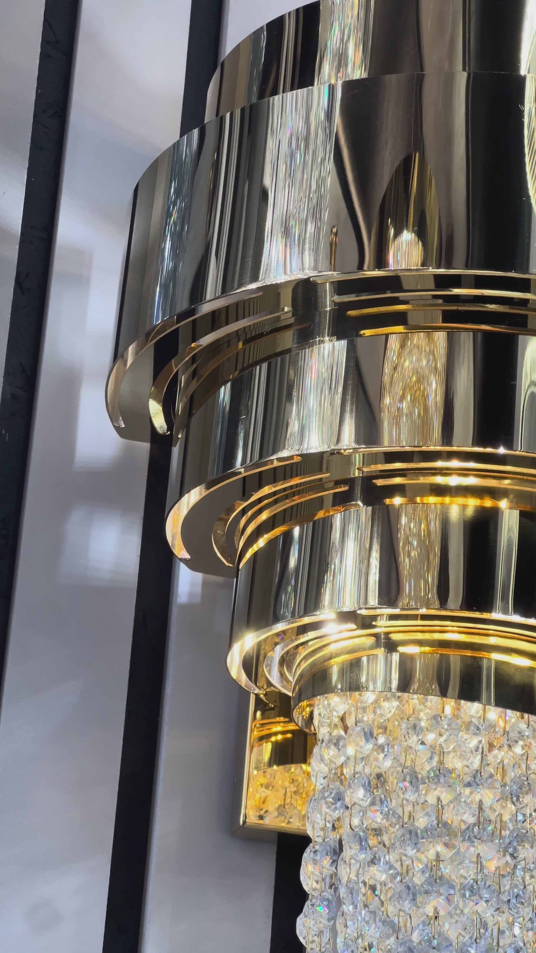 Luxury crystal wall light inspired by the Champs Élysées adding elegance to a refined interior