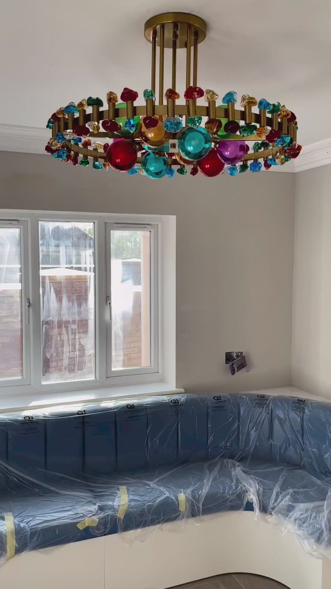 Close-up video of the VORELLI® Alytus pendant light highlighting precision crystal elements and refined lighting design.