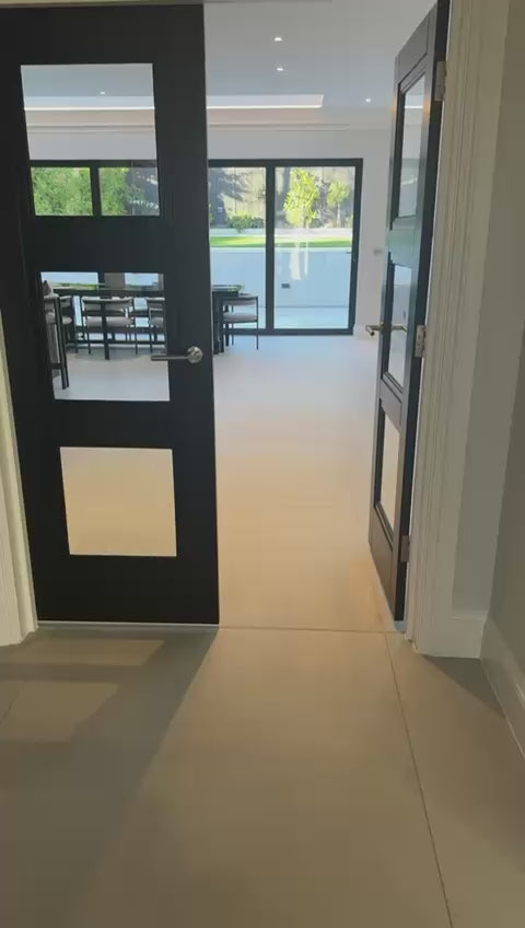 Belvedere Series featuring circular chandelier, wall lights and pendant lights in a luxury interior