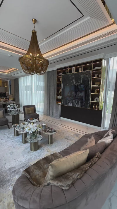 Adlington Grandeur staircase chandelier cascading through a luxury stairwell, featuring flowing crystal chains and a refined architectural statement