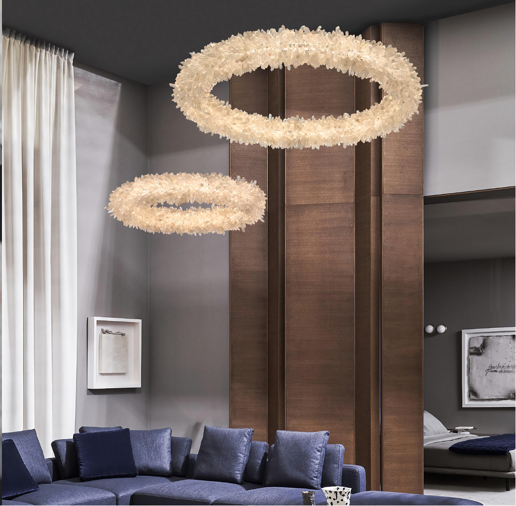Quartz circular organic crystal chandelier installed in modern interior creating soft ambient halo illumination