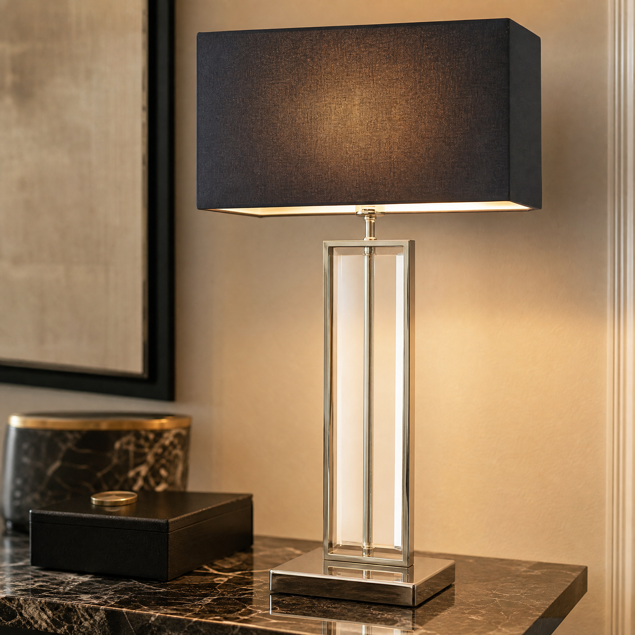 A detailed closeup showing the polished nickel frame and striking crystal center of the VORELLI Ravelle table lamp.