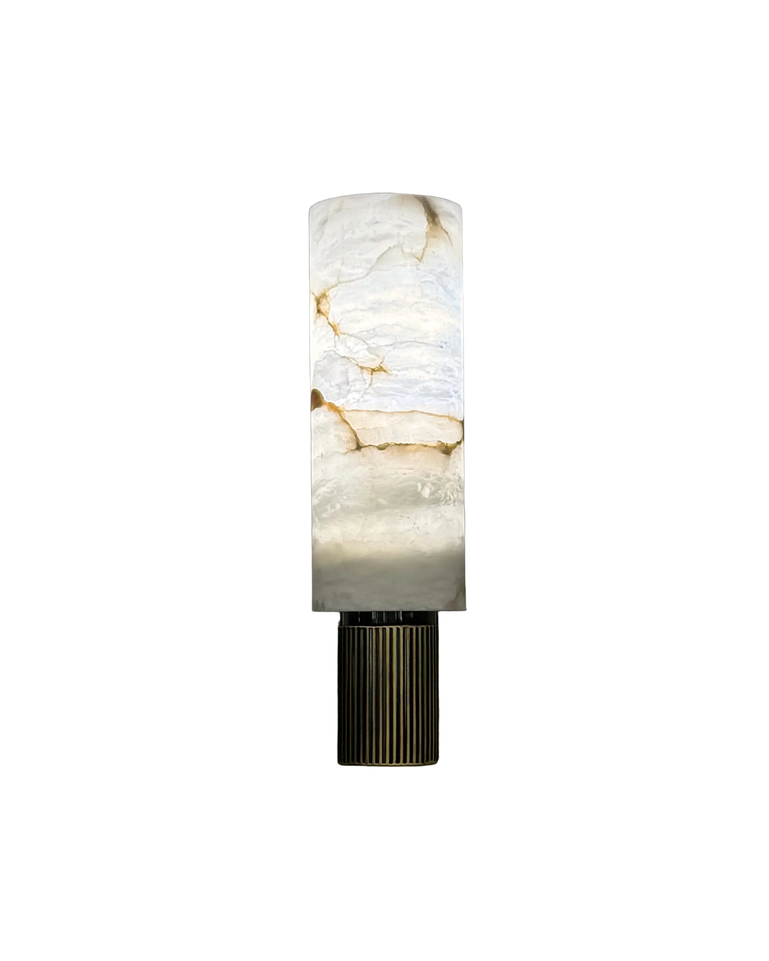 Riviera modern veined marble wall sconce showcasing fluted base and cylindrical stone form
