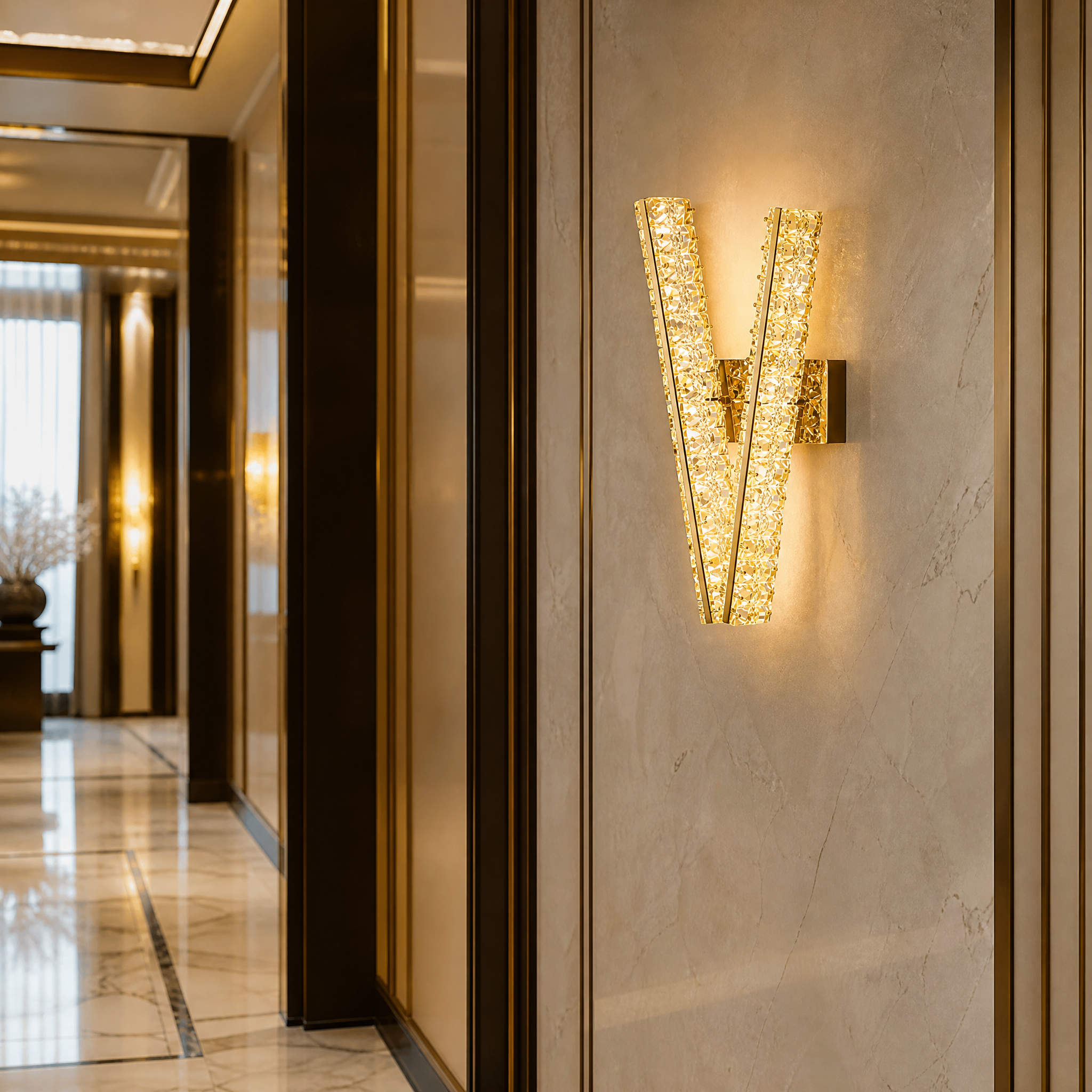 Sophisticated hospitality interior featuring VORELLI Signature 'V' crystal wall sconces providing upscale ambient lighting in a high-end hotel lobby.