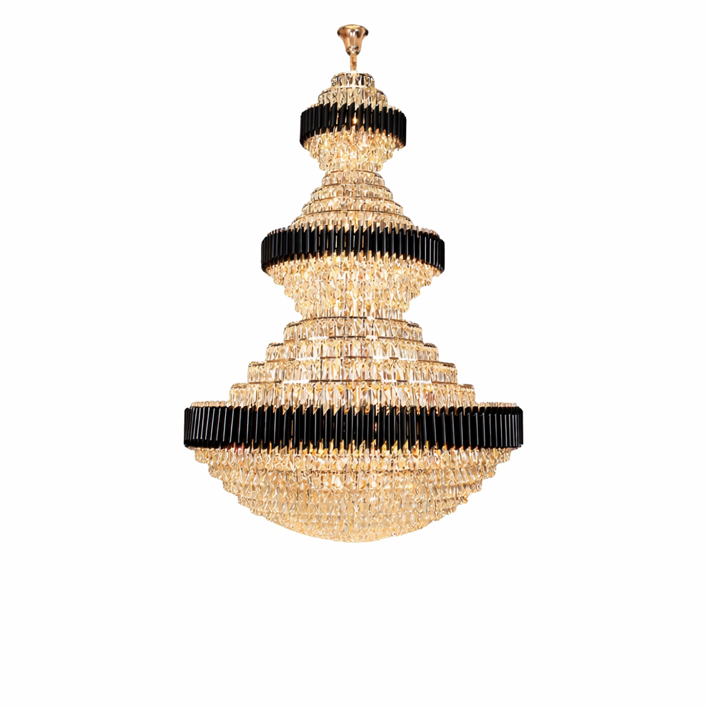 Sophisticated ambiance created by the 3-tier Milltimber Grandeur Staircase Chandelier II, highlighting the intricate play of light through its rectangular crystal components.