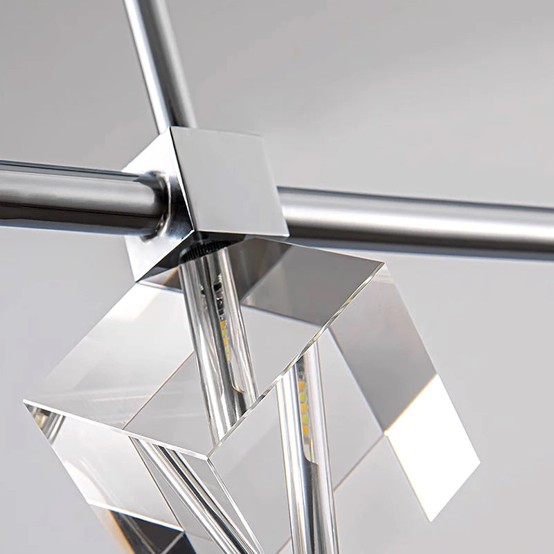 Detailed view of sleek suspension bar and crystal cube structure on Sorrento chandelier