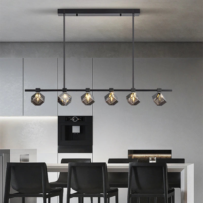 Sorrento modern linear crystal chandelier installed above kitchen island creating refined contemporary lighting
