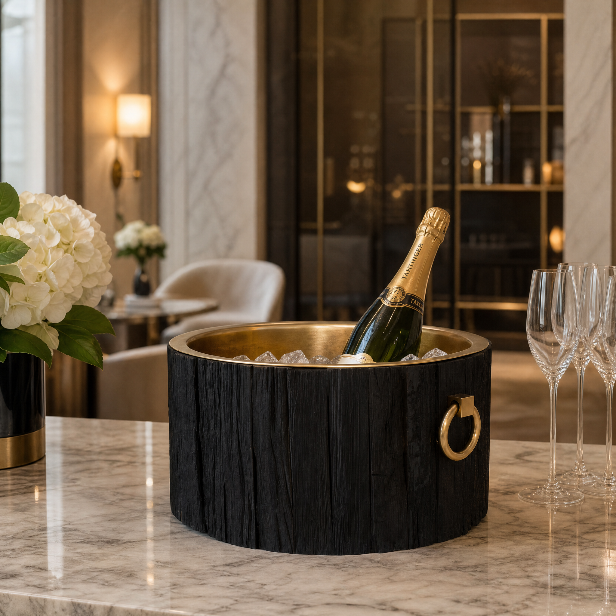 The Sorriso chilled serving piece styled in a high-end hospitality bar environment, showcasing quiet luxury and sophisticated entertaining.