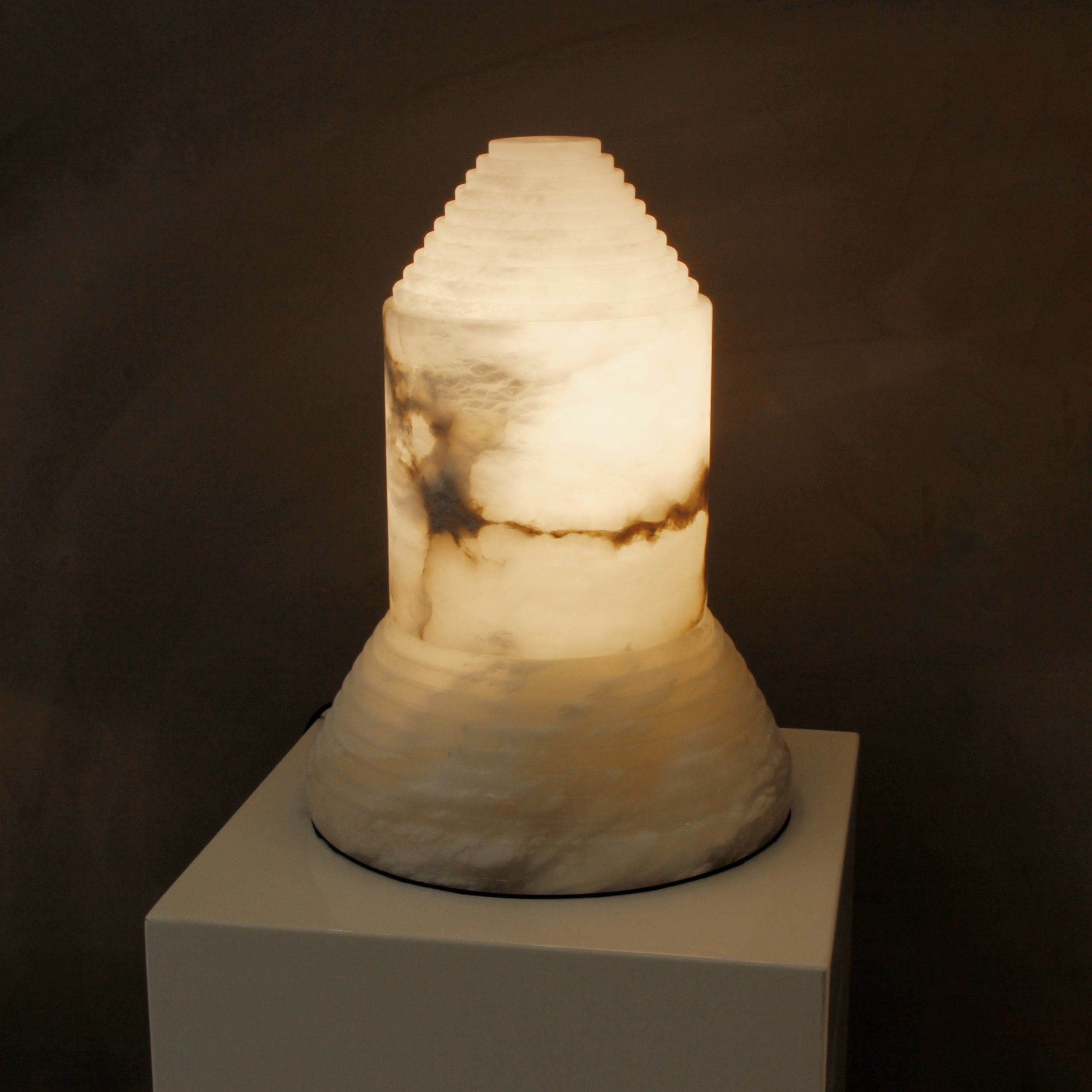 Stratto luxury architectural marble table lamp showcasing sculpted layered stone structure