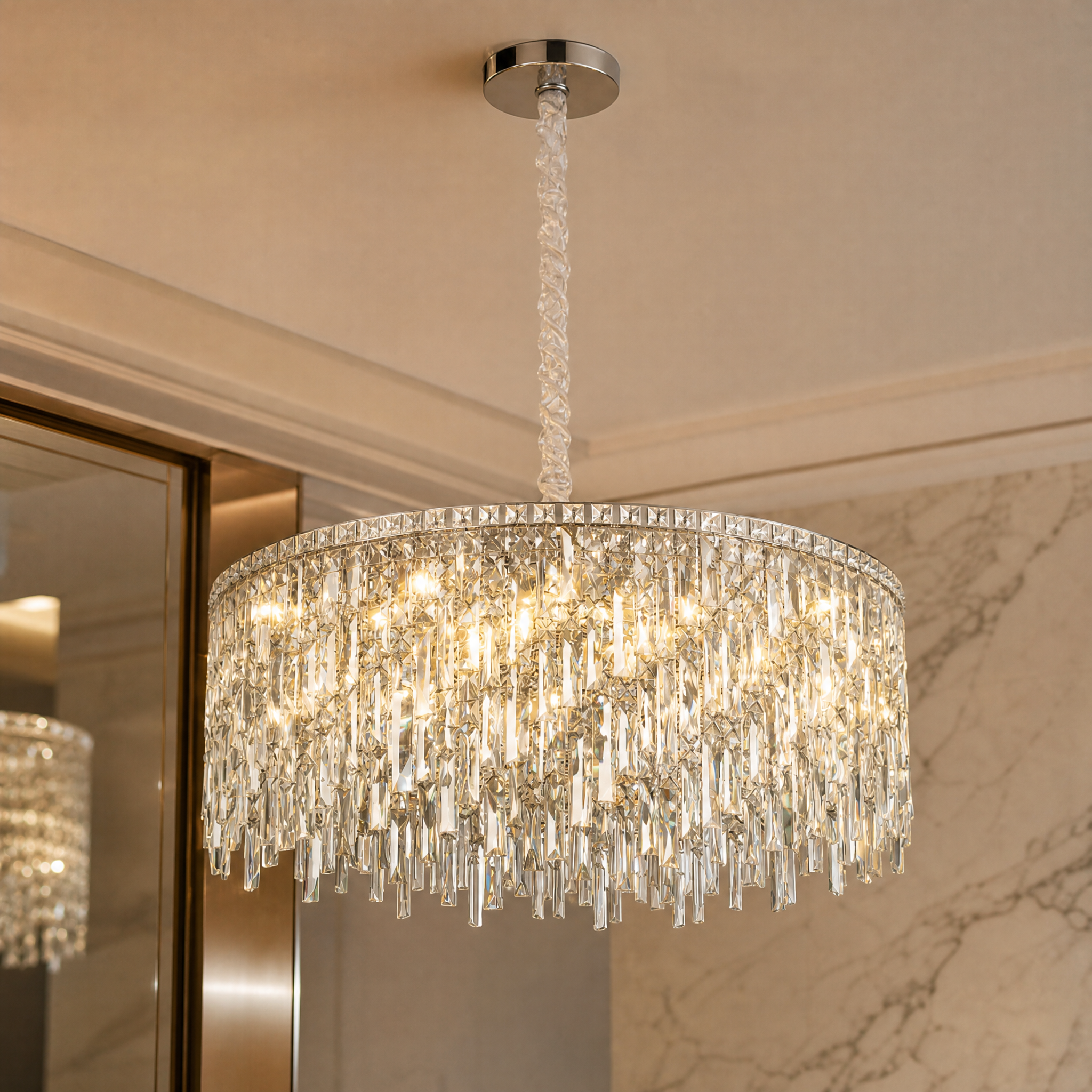 The Abruzzi Circular Chandelier by VORELLI casting a warm, atmospheric glow that enhances the mood of an elegant luxury interior.
