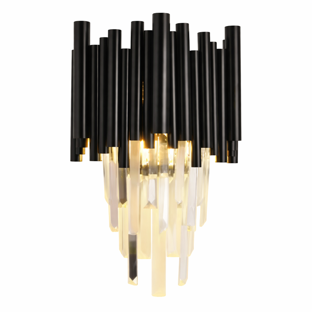 The Gotham Wall Light by VORELLI glows with a moody, sophisticated ambiance, highlighting the premium crystal glass texture and sleek metal framework.