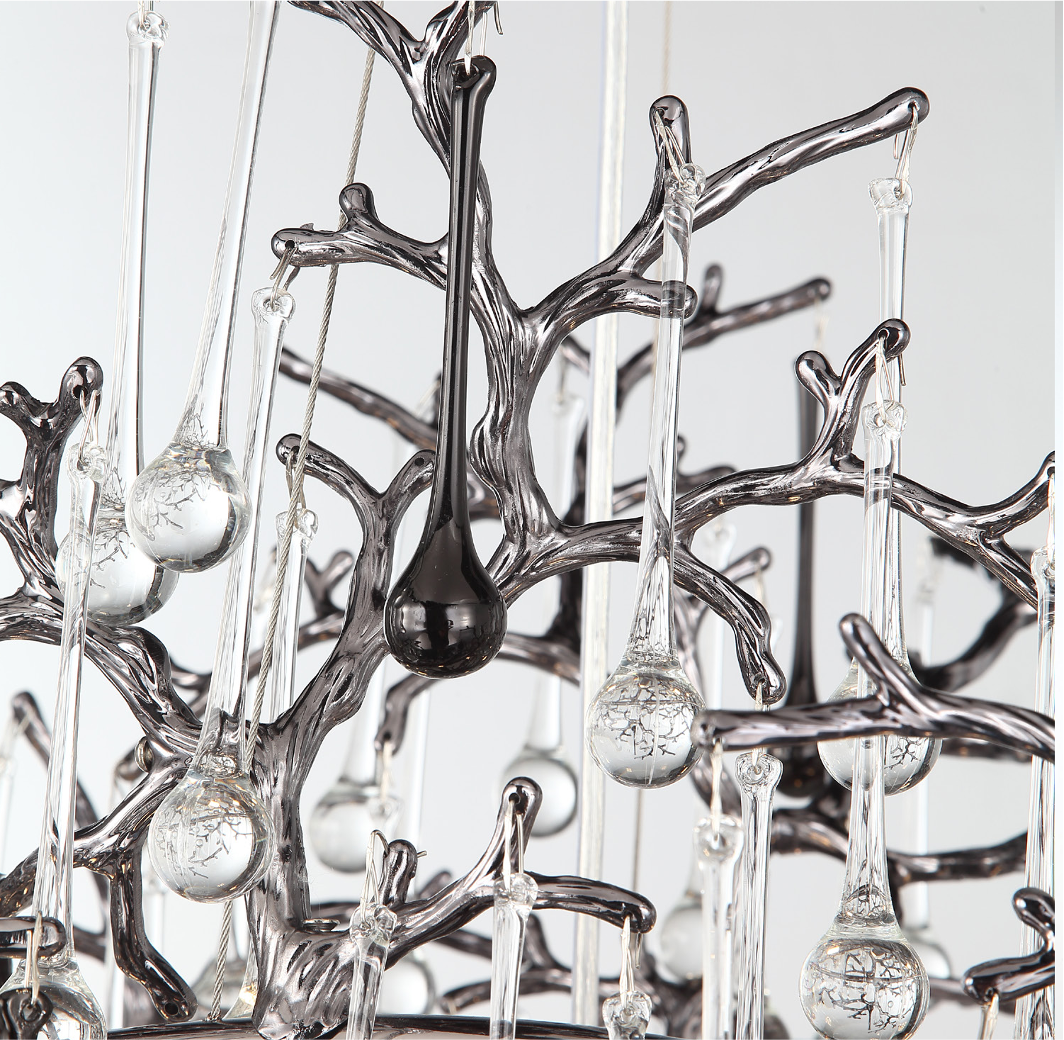 The mood and elegance of the VORELLI L'Albero d'Oro Rectangular Chandelier III designed as a statement piece for high-end luxury interiors.