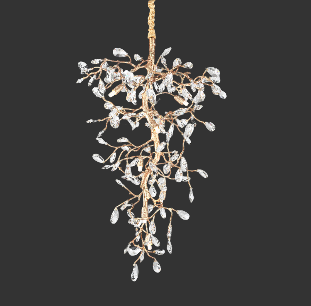 The sculptural, organic form of the Entwine Chandelier by VORELLI hanging gracefully in a modern double-height interior, embodying celestial movement.