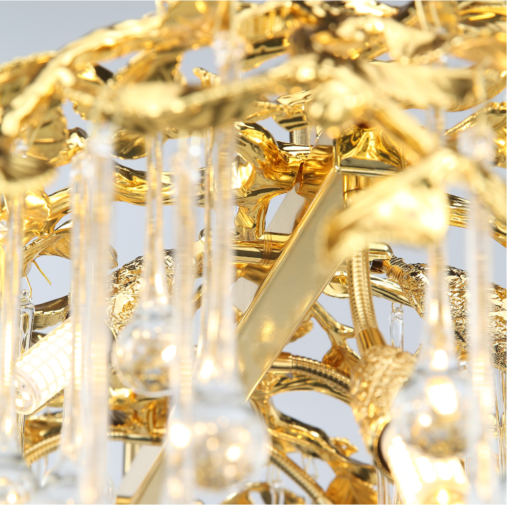 The sophisticated silhouette of the VORELLI L’Albero d’Oro designer light fixture, bringing understated drama and refined luxury to a high-end interior space.