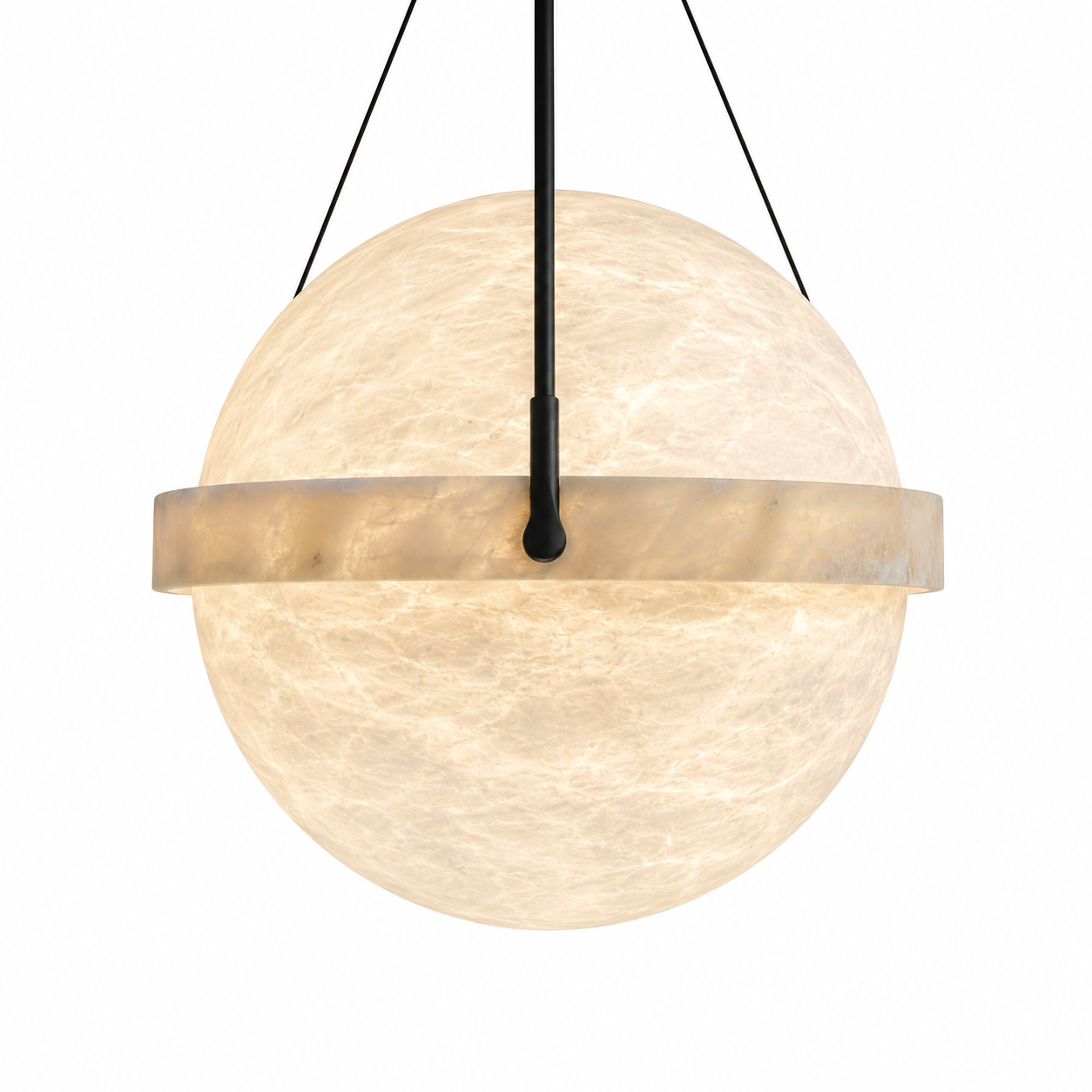 The Volana marble pendant light casting soft ambient glow with its celestial spherical design