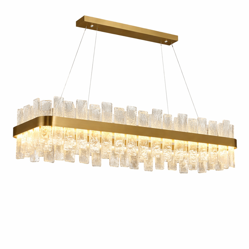 The VORELLI Kensington Rectangular Chandelier illuminating a luxury dining room with modern sophistication.