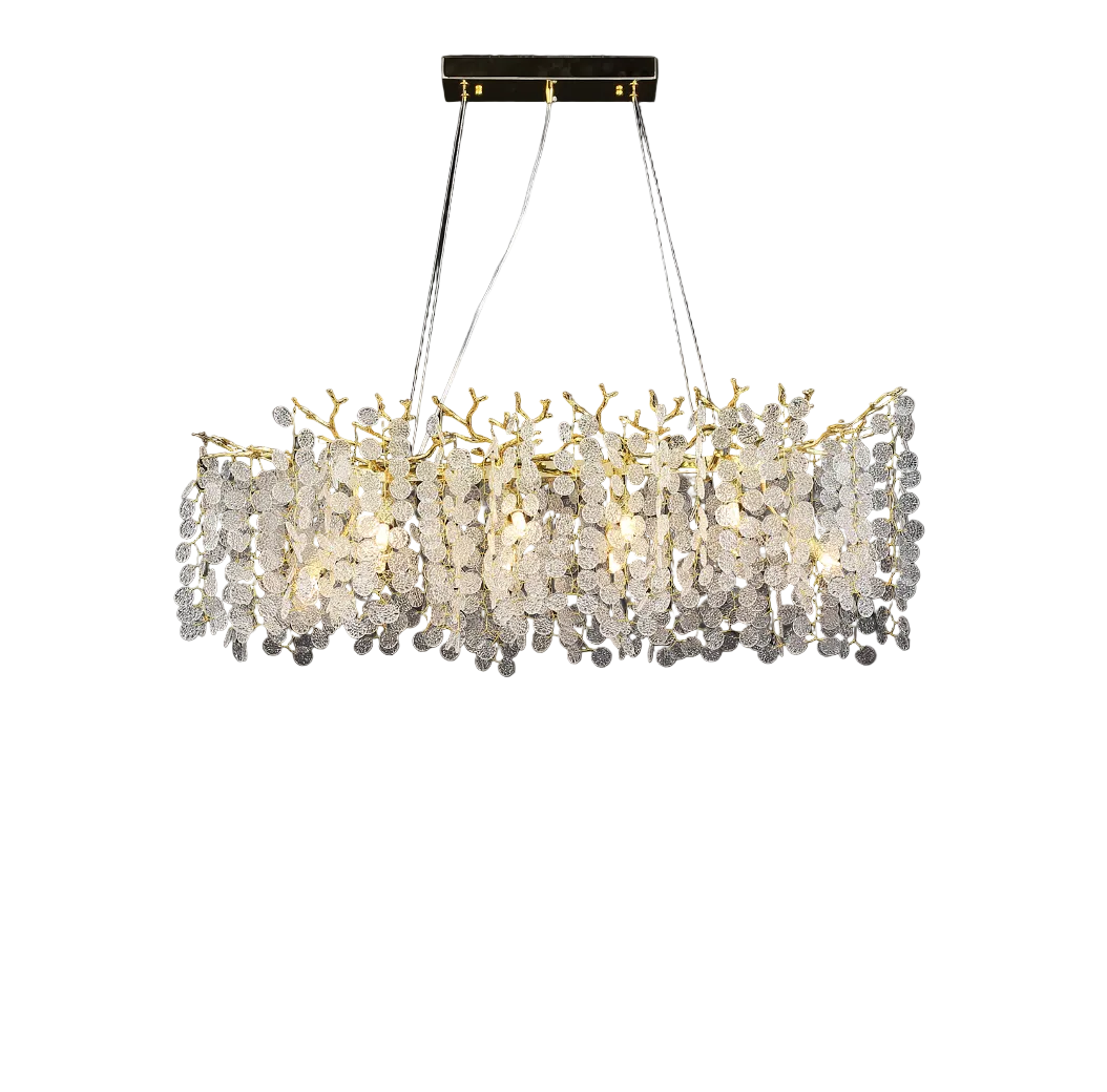 The VORELLI Lunaria rectangular chandelier casting a warm, soft ambient glow through its multi-layered textured glass discs for a refined, luxurious mood.