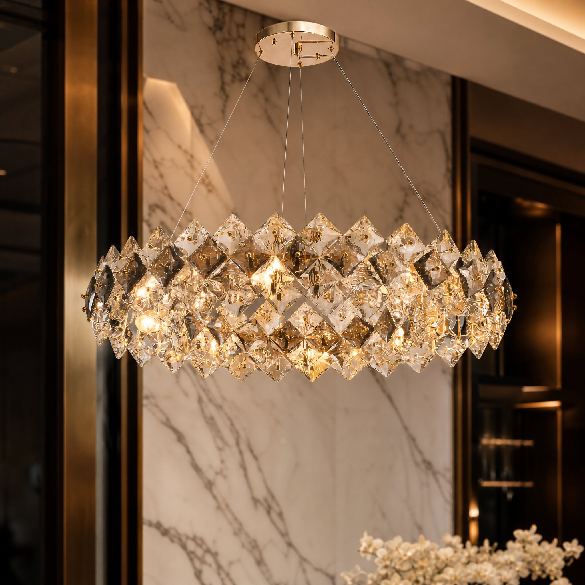 Macro close-up shot of the clear and smoky grey diamond cut crystal squares on the VORELLI Thirlmere chandelier.