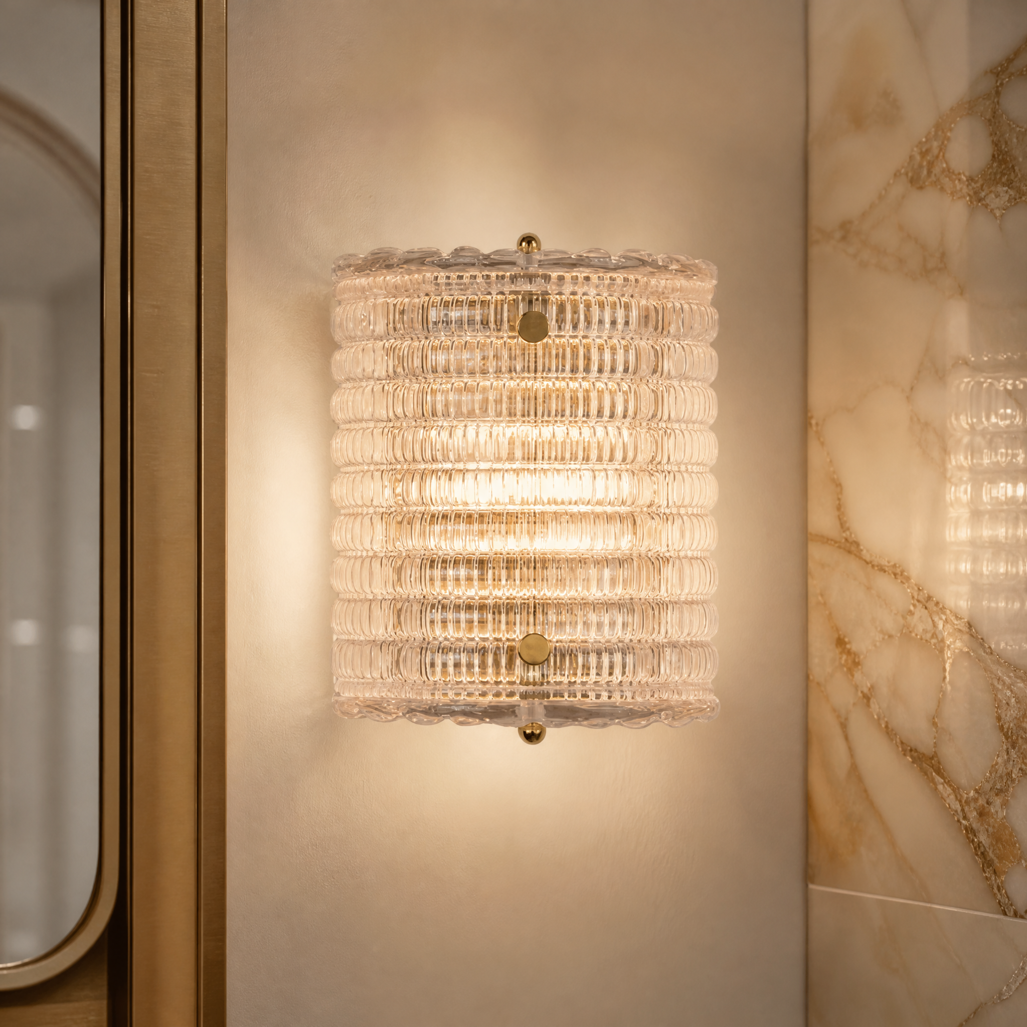 Macro closeup of the VORELLI Torcello wall light highlighting the intricate texture of the waffle glass shade and brass finish details.