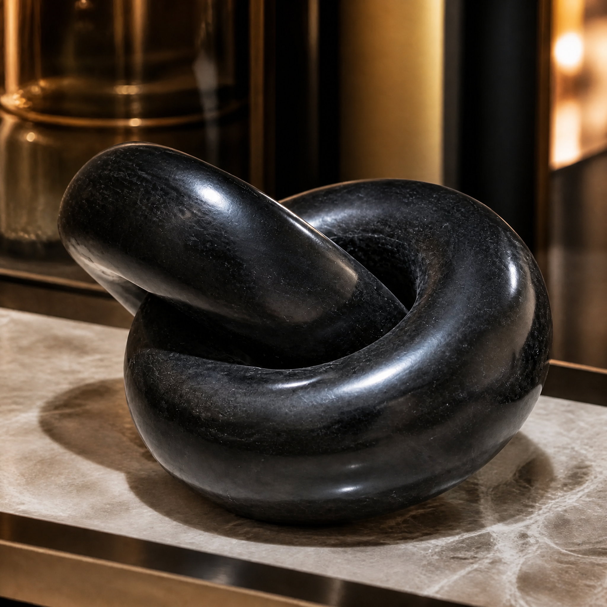 A macro close-up of the VORELLI Torrino Black Link Decor, revealing the rich black stone textures and subtle natural veining on the polished marble interlocking surface.