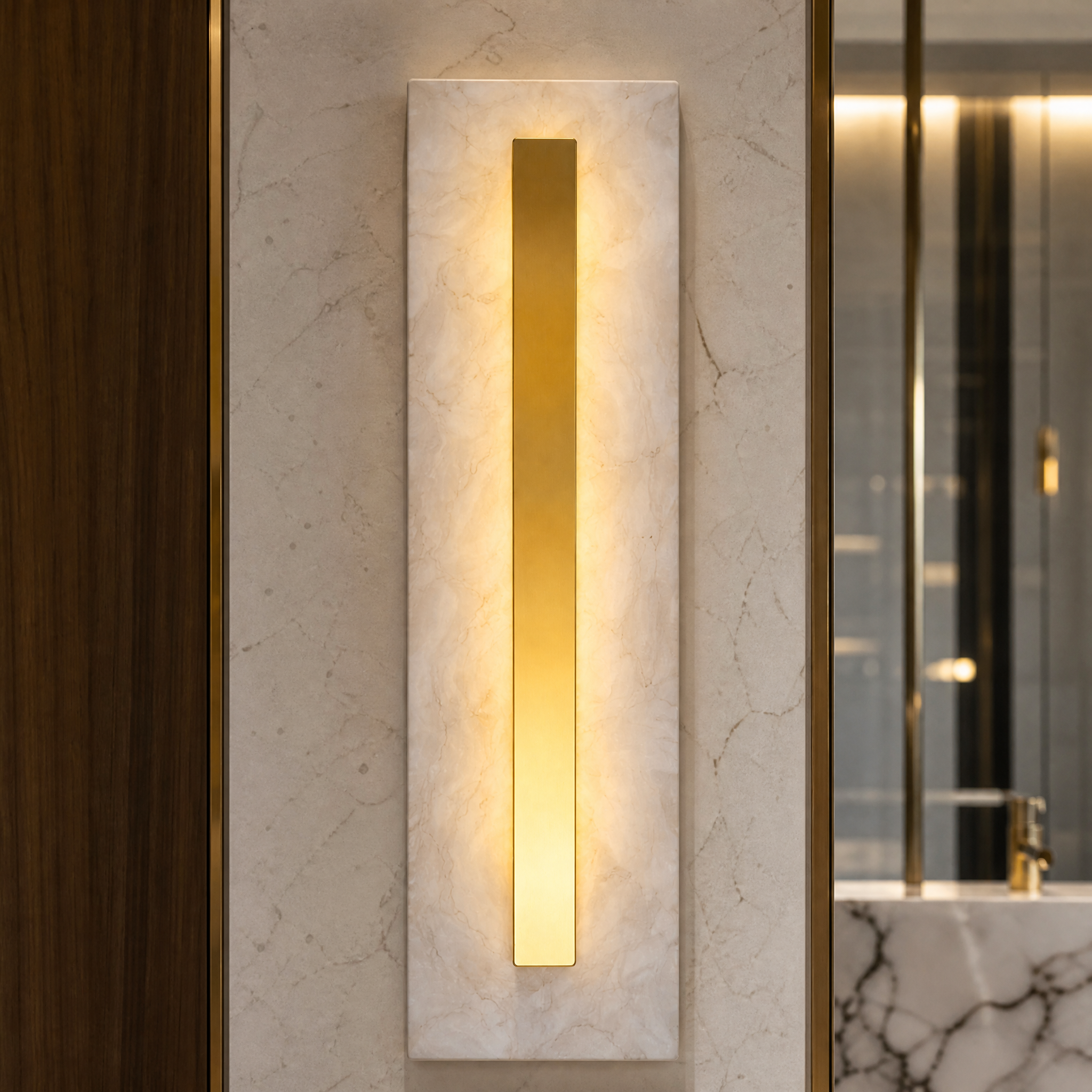 A detailed close-up of the VORELLI Treviso Marble Wall Light II, highlighting the sharp rectangular lines, textured marble surface, and the premium recessed gold center.