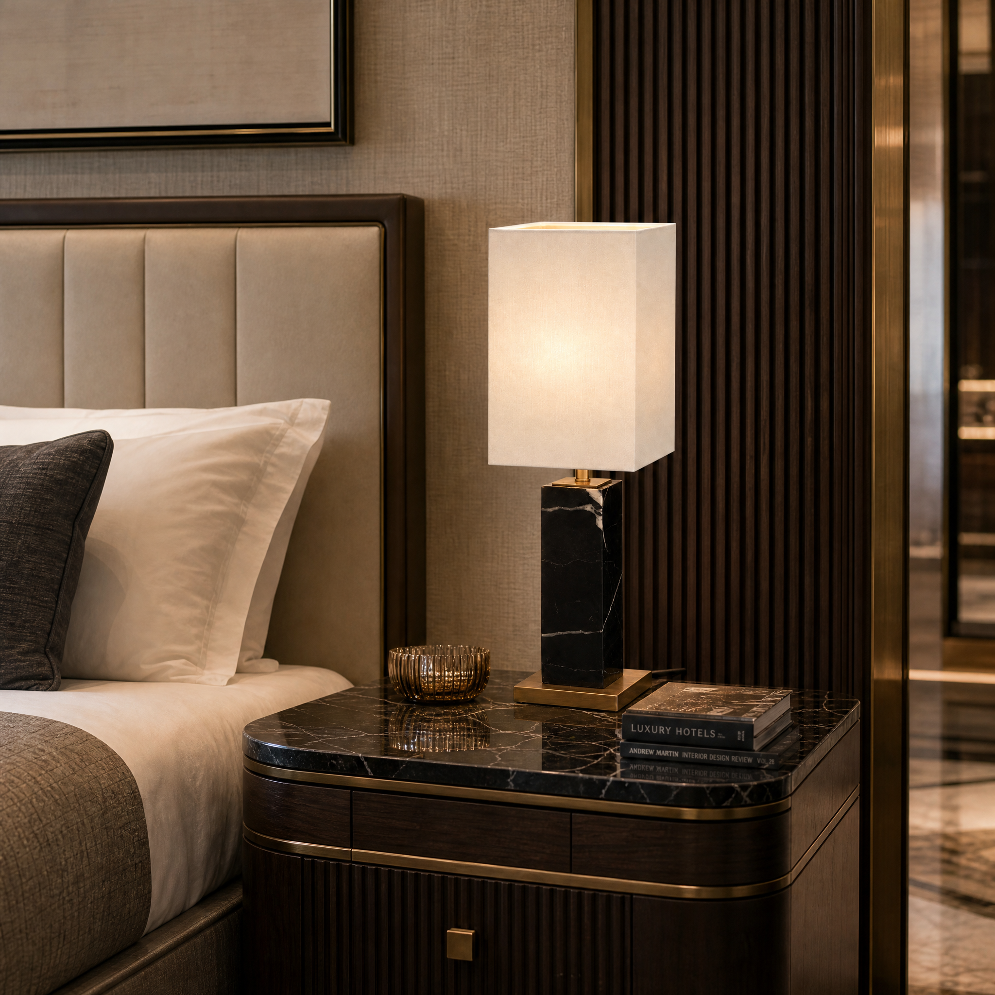 Refined Valdoro marble table lamp enhancing the ambiance of a luxury hotel suite nightstand